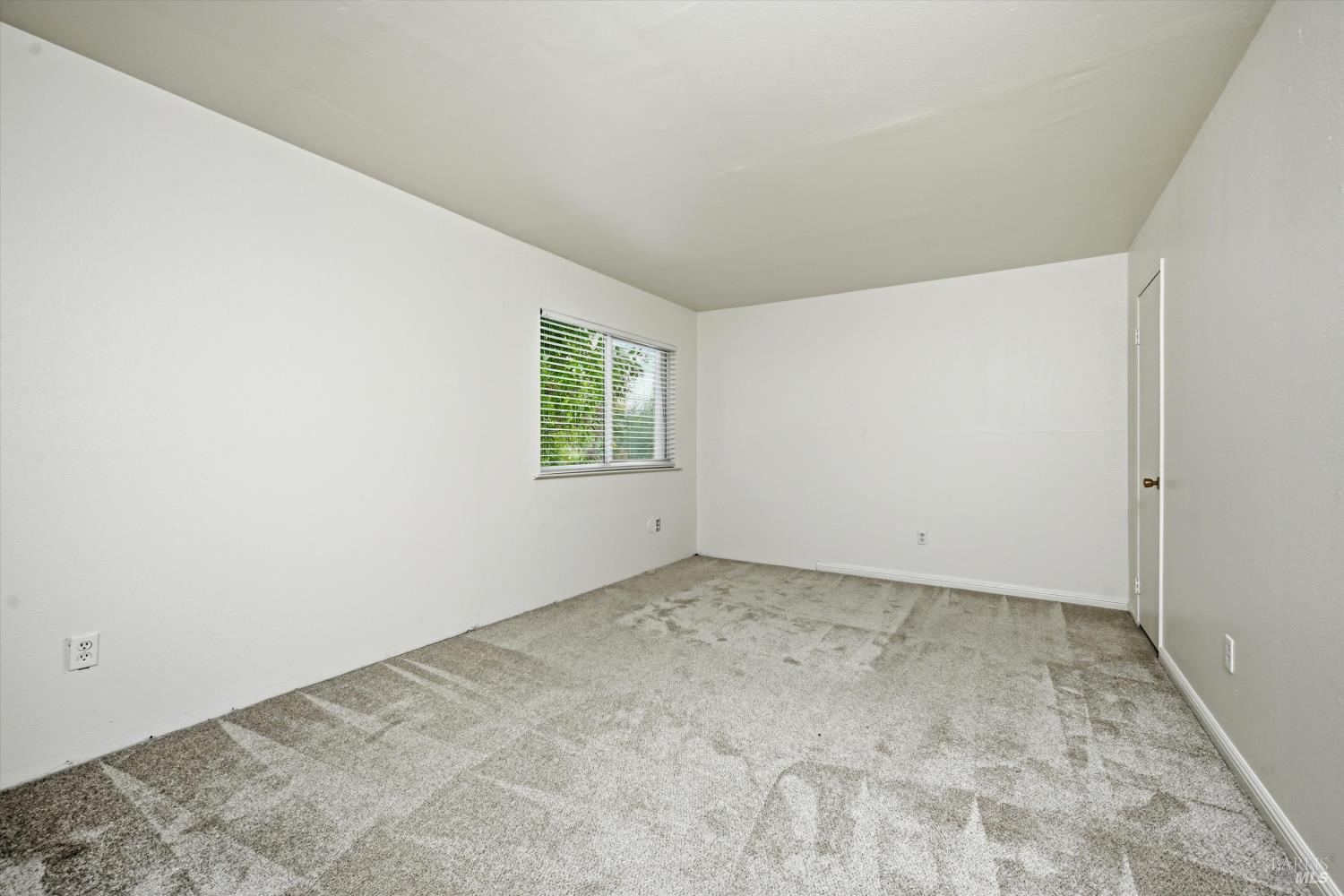 1213 Fair Oaks Avenue Santa Rosa, CA 95404 - Photo 15 of 27 an empty room with a window