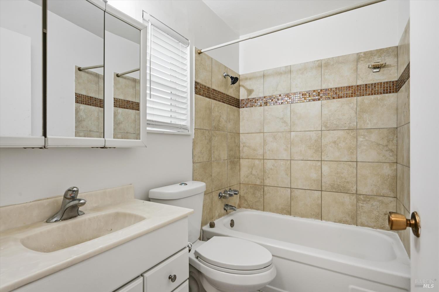 1213 Fair Oaks Avenue Santa Rosa, CA 95404 - Photo 17 of 27 a bathroom with a sink toilet and shower