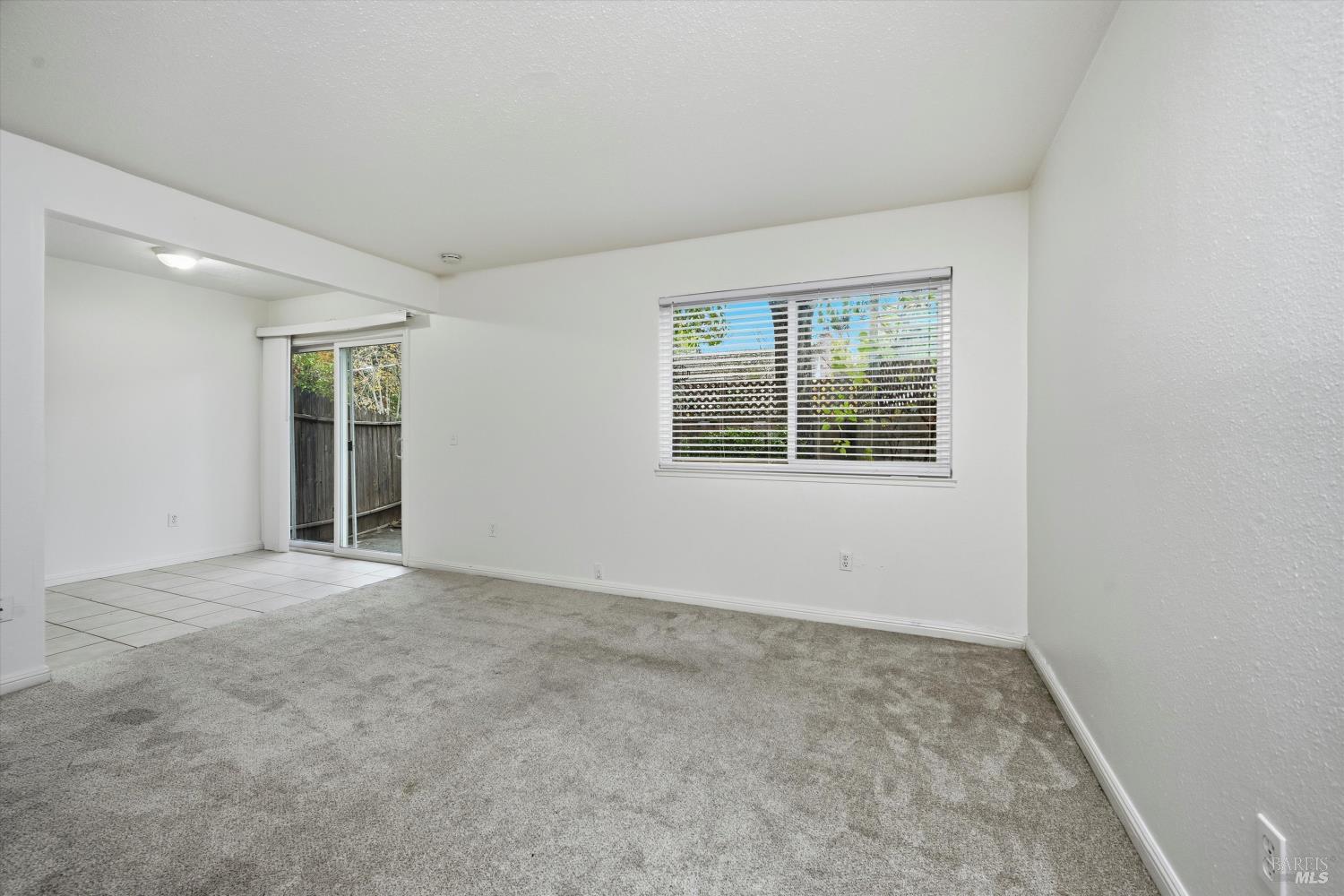 1213 Fair Oaks Avenue Santa Rosa, CA 95404 - Photo 9 of 27 an empty room with windows