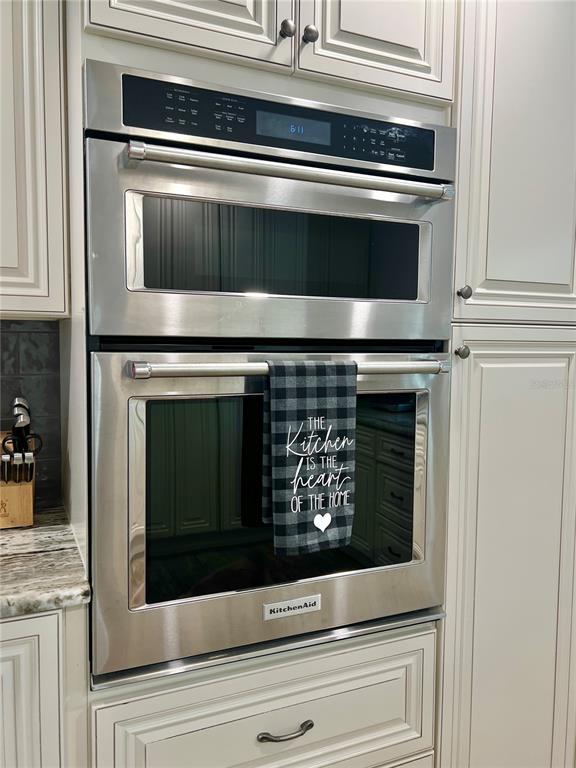 3535 Moores Lake Road Dover, FL 33527 - Photo 16 of 85 A Kitchen Aid wall oven and a Kitchen Aid microwave, top of the line brand.