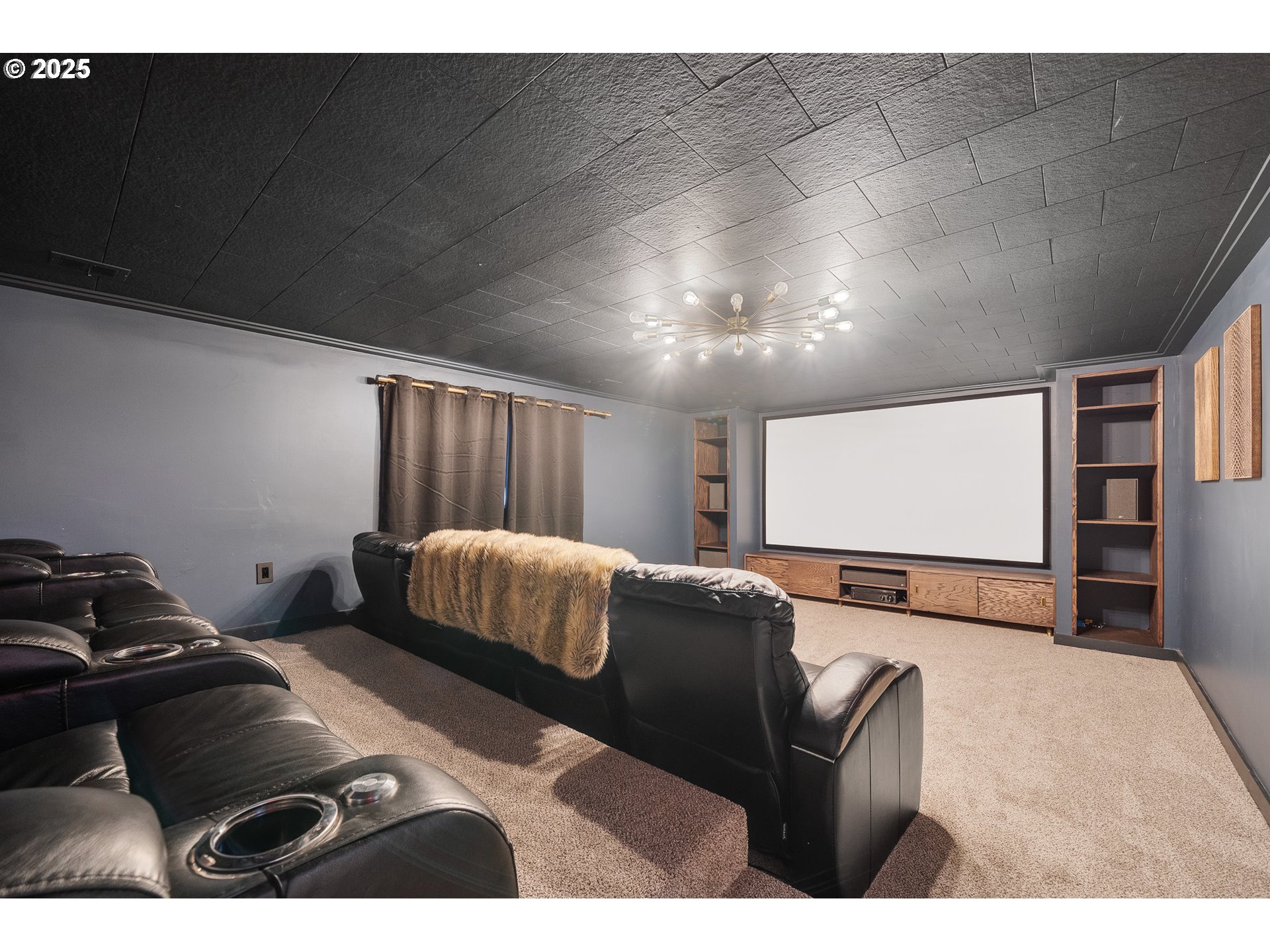 33281 Kammeyer Road Scappoose, OR 97056 - Photo 23 of 48 a living room with furniture and a flat screen tv