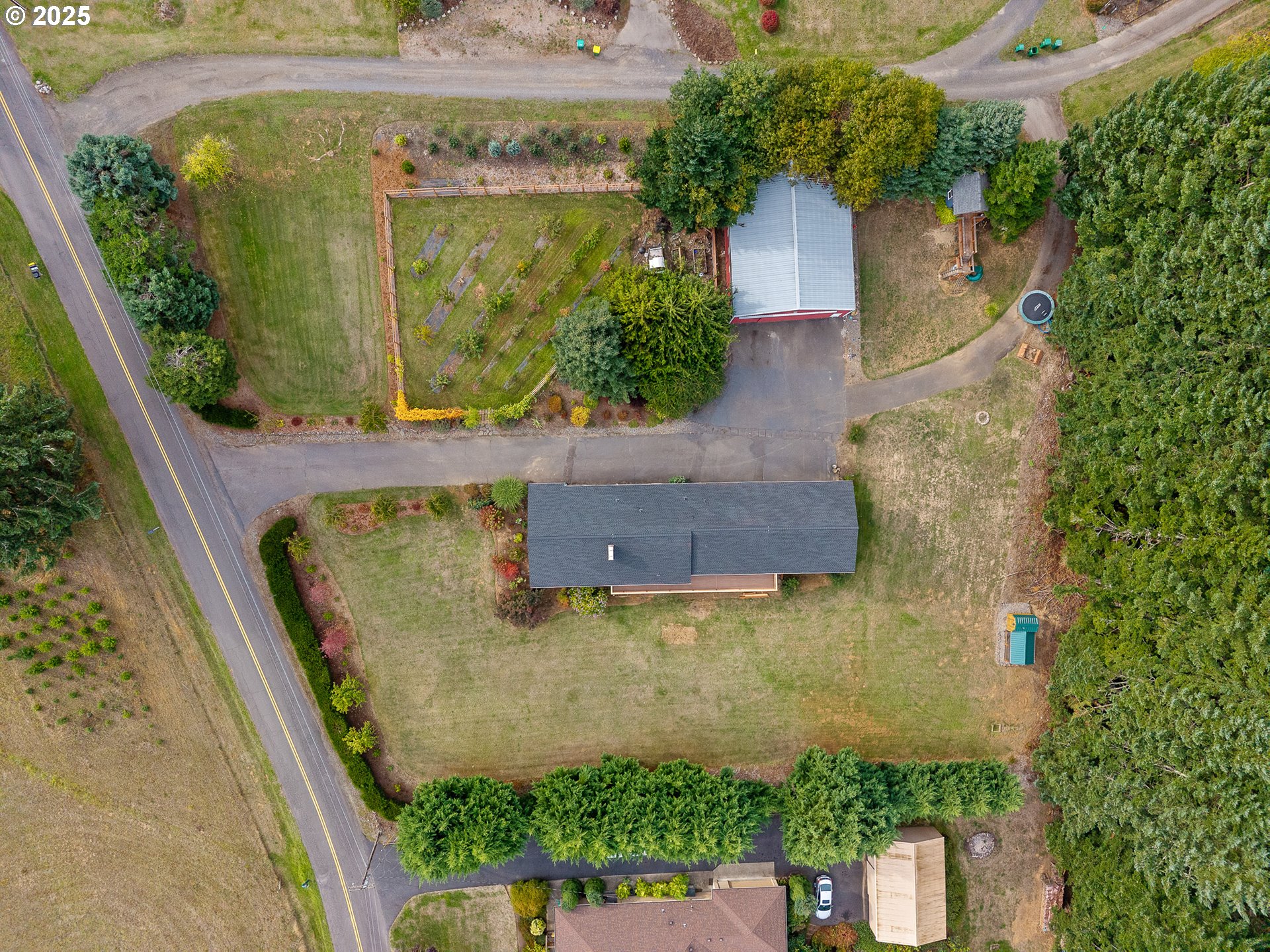 33281 Kammeyer Road Scappoose, OR 97056 - Photo 4 of 48 an aerial view of a residential houses with outdoor space