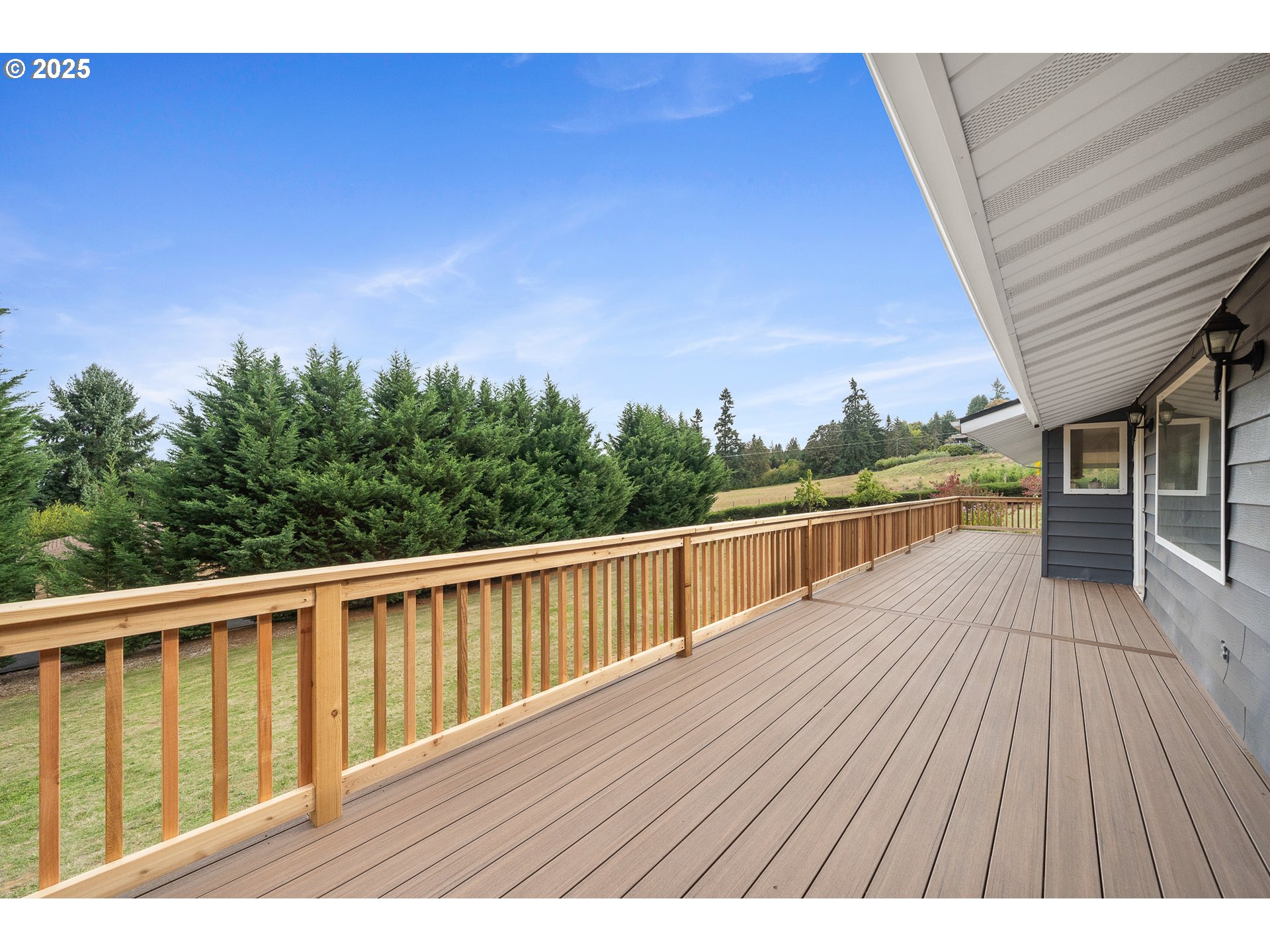 33281 Kammeyer Road Scappoose, OR 97056 - Photo 43 of 48 a view of balcony with wooden floor and fence
