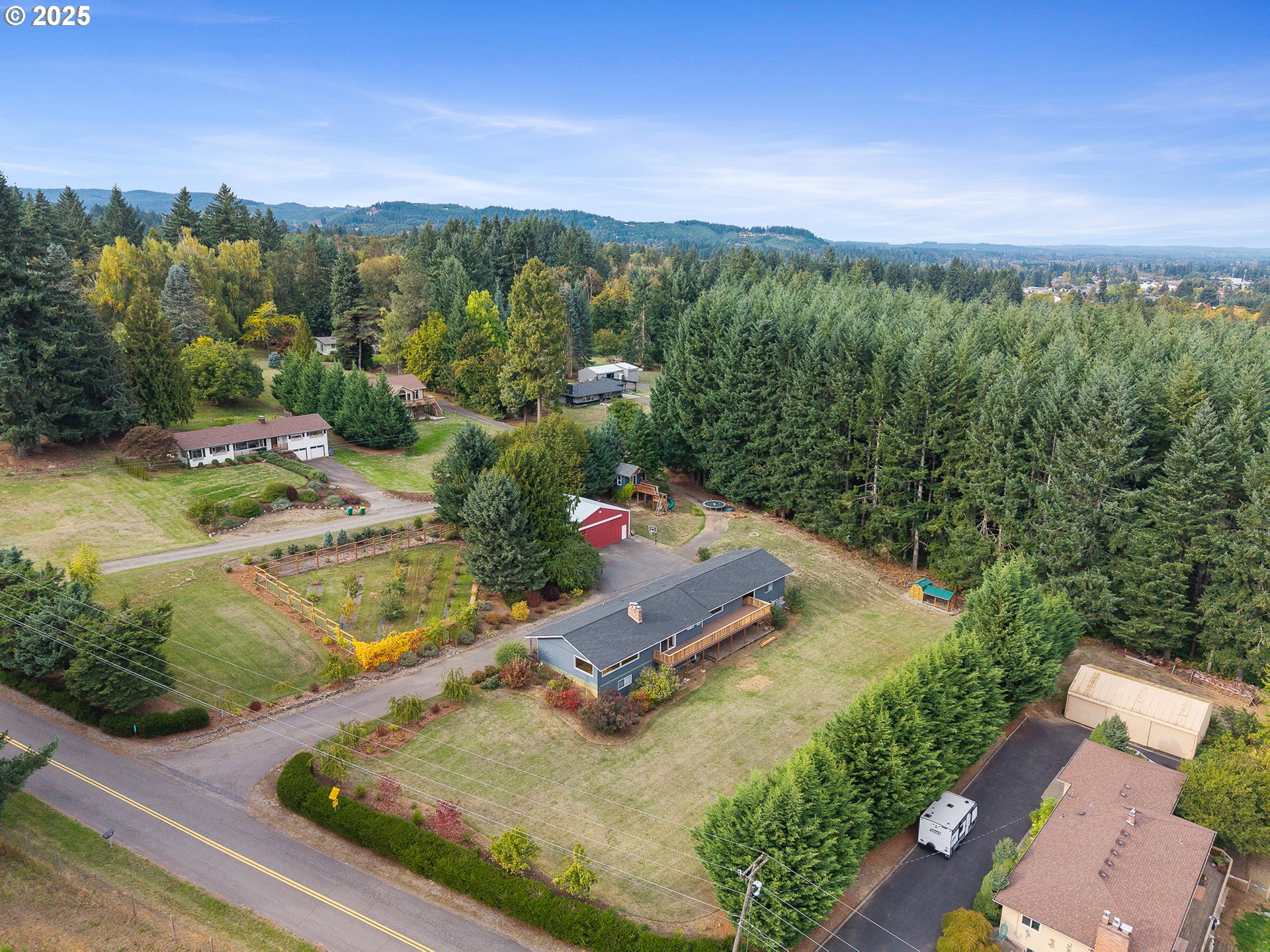 33281 Kammeyer Road Scappoose, OR 97056 - Photo 47 of 48 an aerial view of a house with a garden