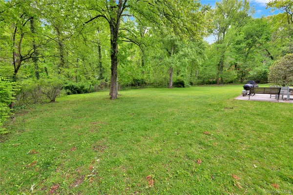 a view of a backyard with a small house