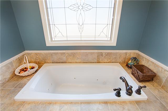 17215 Lakeside Estates Road Athens, AL 35614 - Photo 14 of 20 a bathroom with a tub