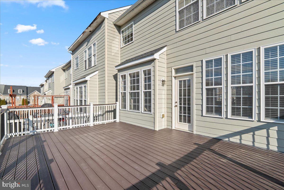 927 Buttonwood Terrace Northeast Leesburg, VA 20176 - Photo 20 of 44 a view of a house with wooden floor