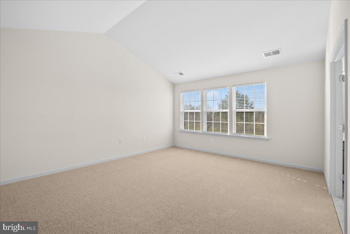 927 Buttonwood Terrace Northeast Leesburg, VA 20176 - Photo 28 of 44 an empty room with windows