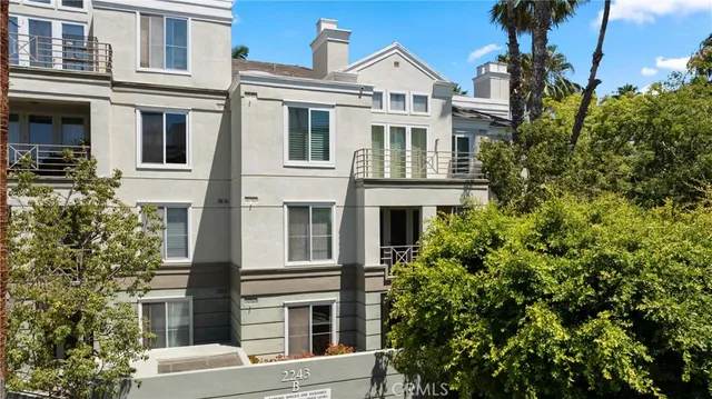a front view of a multi story residential apartment building
