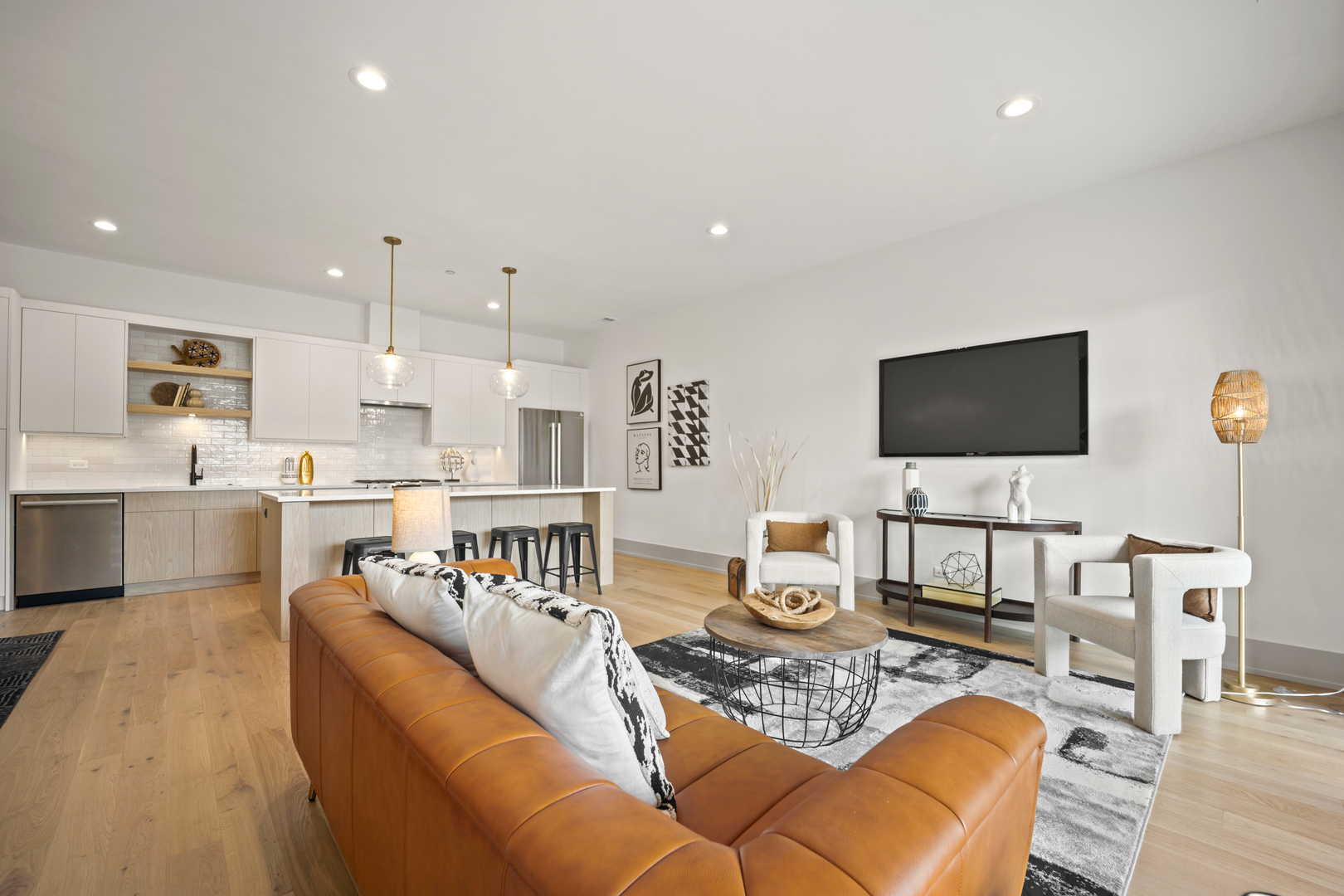 1548 West Ardmore Avenue, Unit 3B Chicago, IL 60660 - Photo 14 of 32 a living room with furniture and a flat screen tv