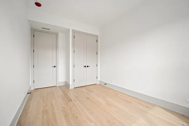 a bathroom with a bathtub sink vanity and a mirror