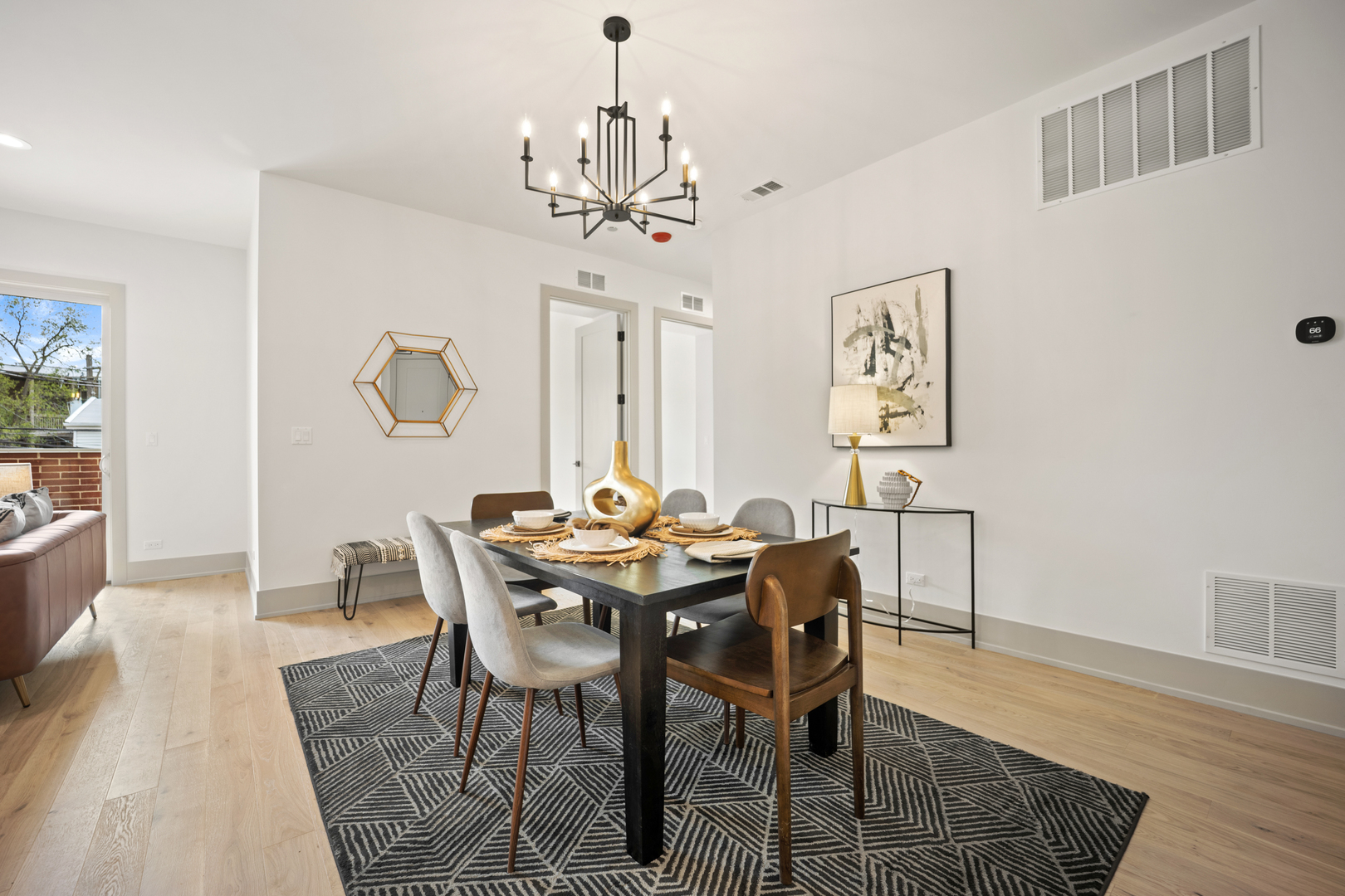 1548 West Ardmore Avenue, Unit 3B Chicago, IL 60660 - Photo 3 of 32 a view of a dining room with furniture and wooden floor