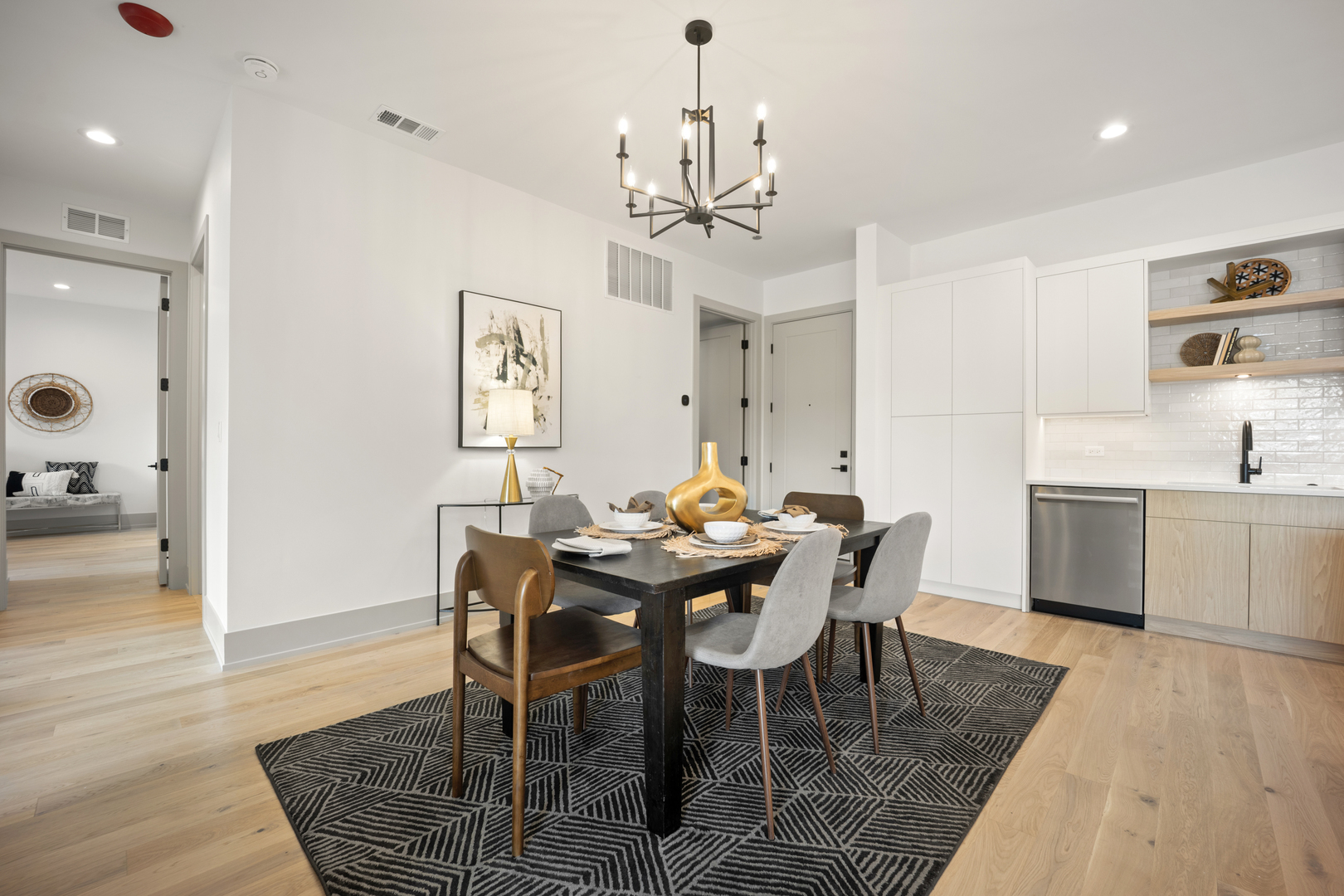 1548 West Ardmore Avenue, Unit 3B Chicago, IL 60660 - Photo 5 of 32 a view of a dining room with furniture and wooden floor