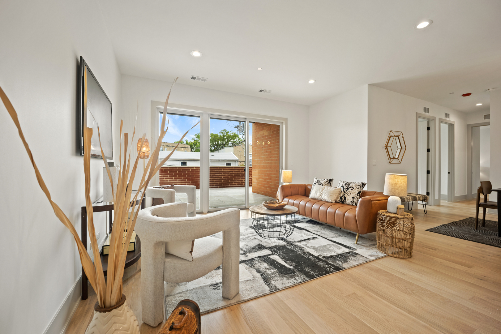 1548 West Ardmore Avenue, Unit 3B Chicago, IL 60660 - Photo 10 of 32 a living room with furniture and a large window
