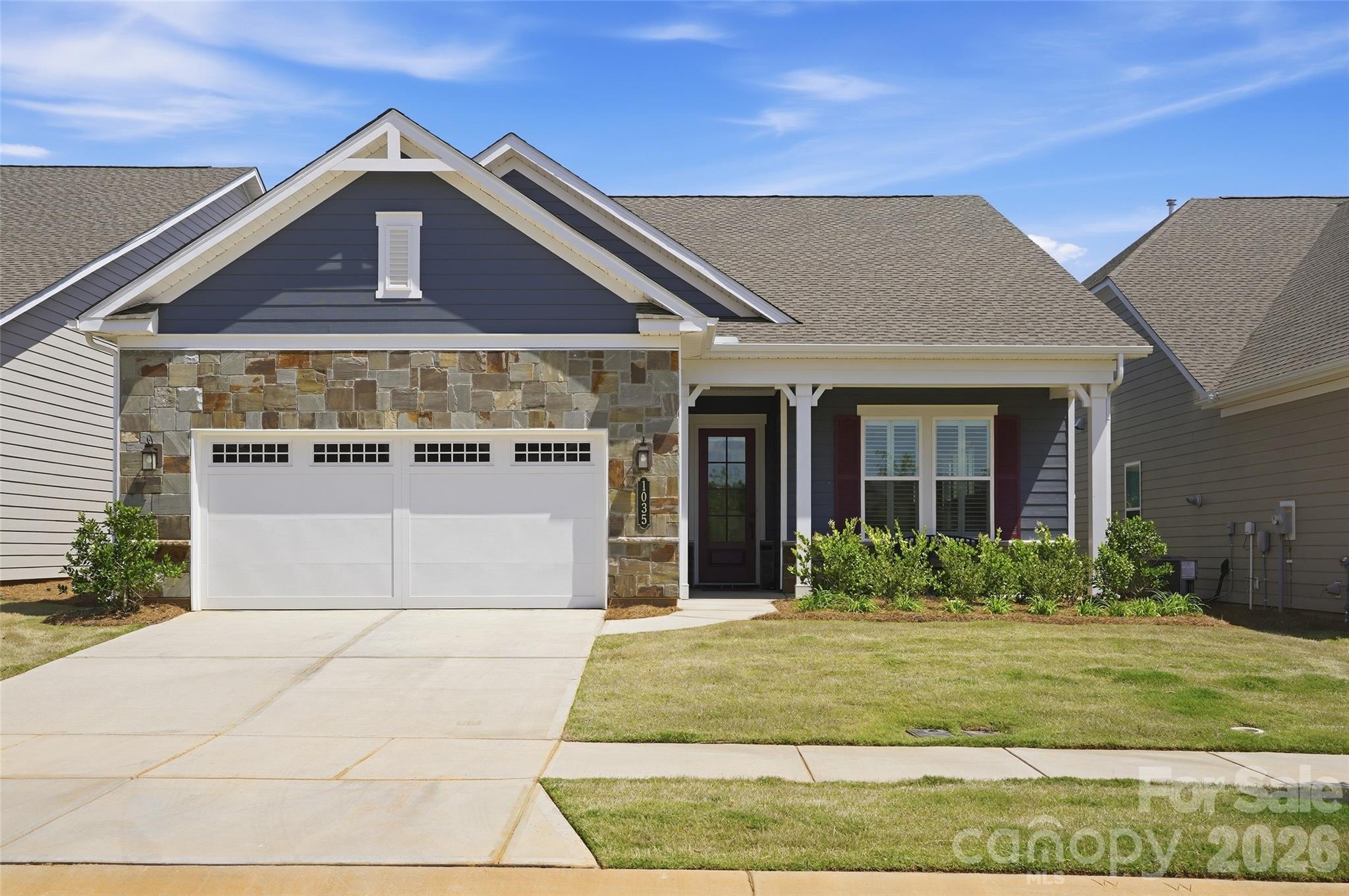 1035 Rabbit Hl Lane Monroe, NC 28110 - Photo 38 of 39 a front view of a house with garden