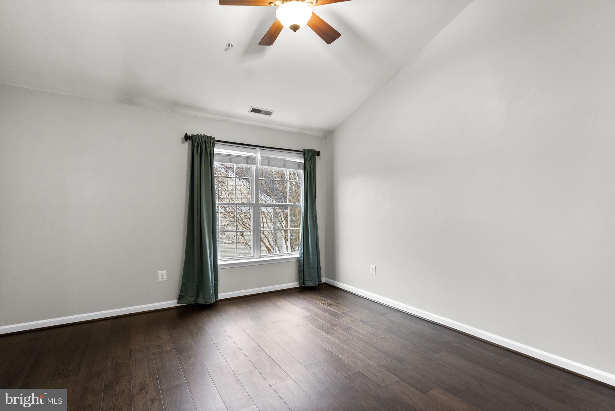 758 Howards Loop Annapolis, MD 21401 - Photo 19 of 64 Primary Bedroom With Window Overlooking Rear Yard