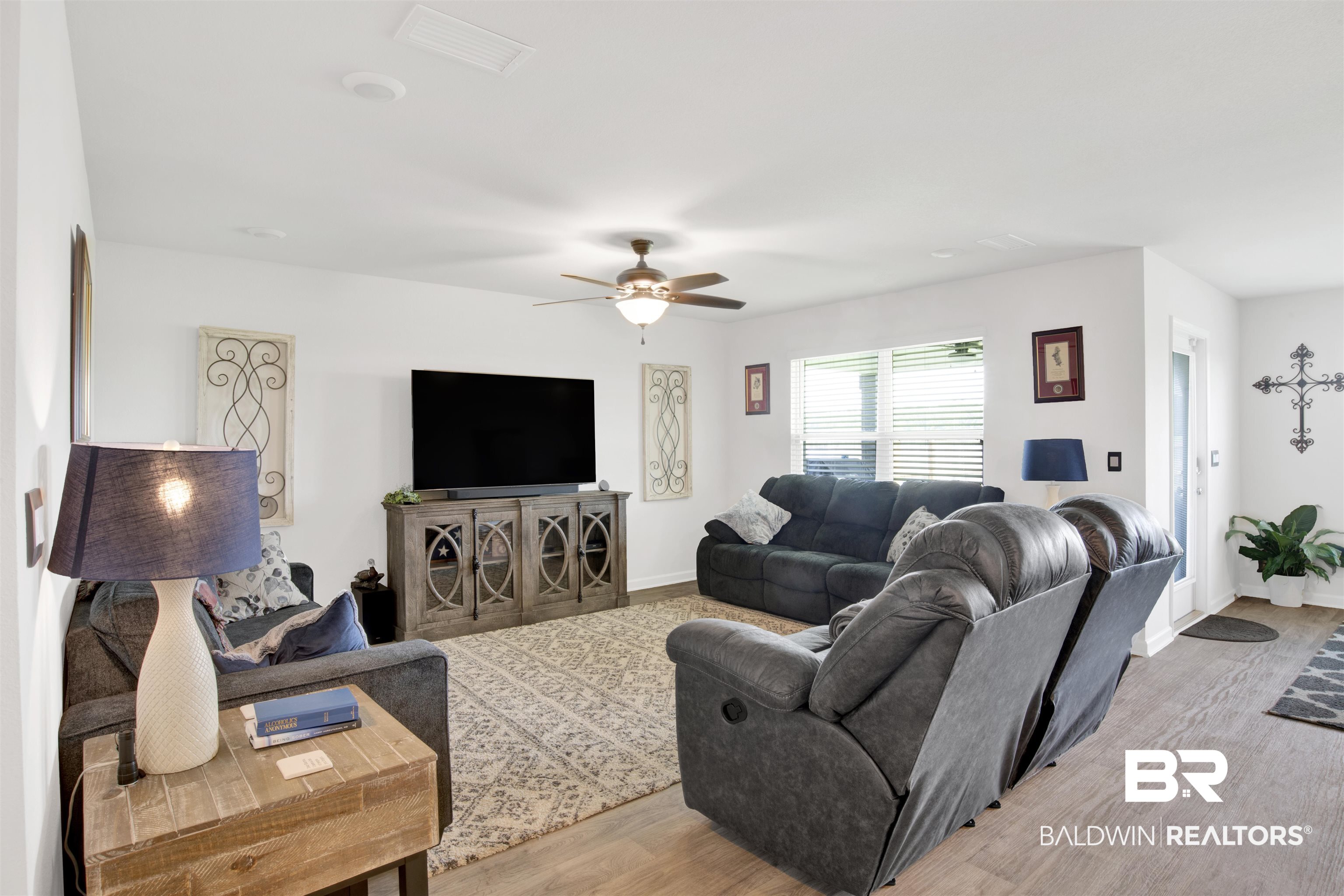 14731 Forsythia Loop Silverhill, AL 36576 - Photo 19 of 25 Living room featuring light hardwood / wood-style flooring and ceiling fan