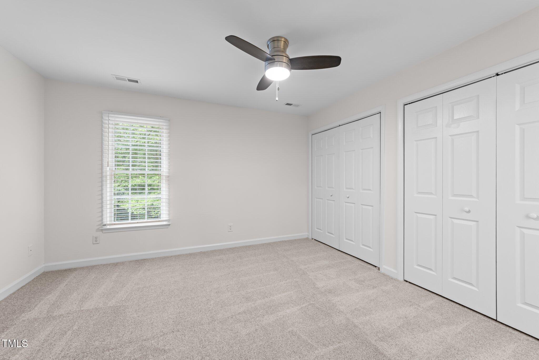 4541 Hershey Court Raleigh, NC 27613 - Photo 14 of 25 a view of an empty room with a window