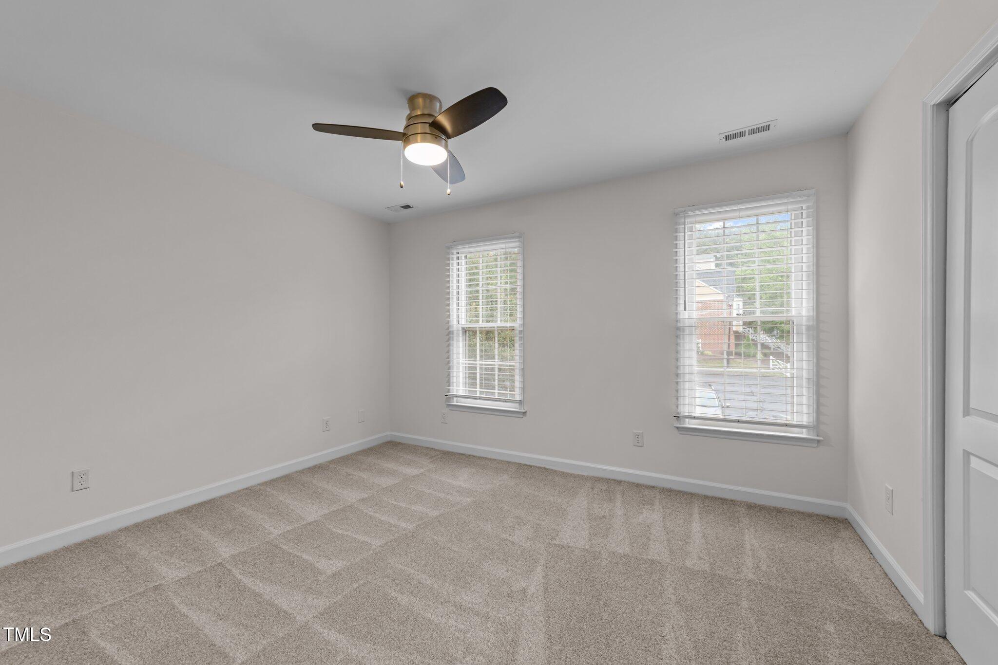4541 Hershey Court Raleigh, NC 27613 - Photo 10 of 25 a view of an empty room with a window
