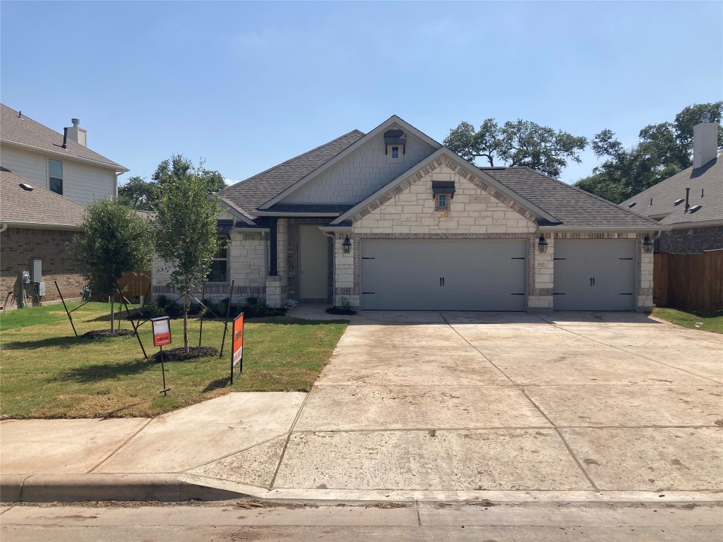 1920 Lakeside Ranch Road Georgetown, TX 78633 - Photo 1 of 1 a view of garage yard and deck