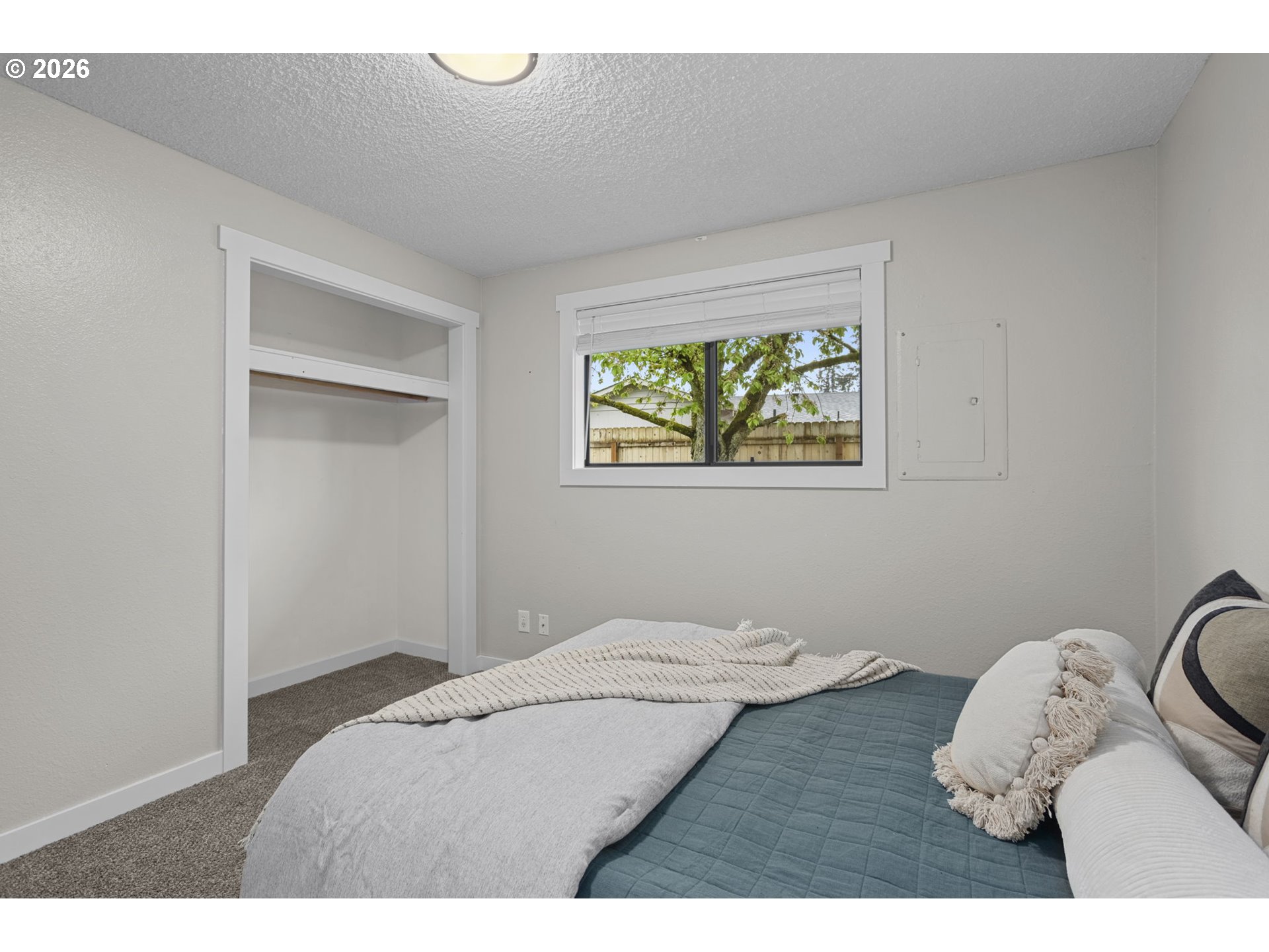 7 Olive Court Longview, WA 98632 - Photo 19 of 35 a bedroom with a bed and a window