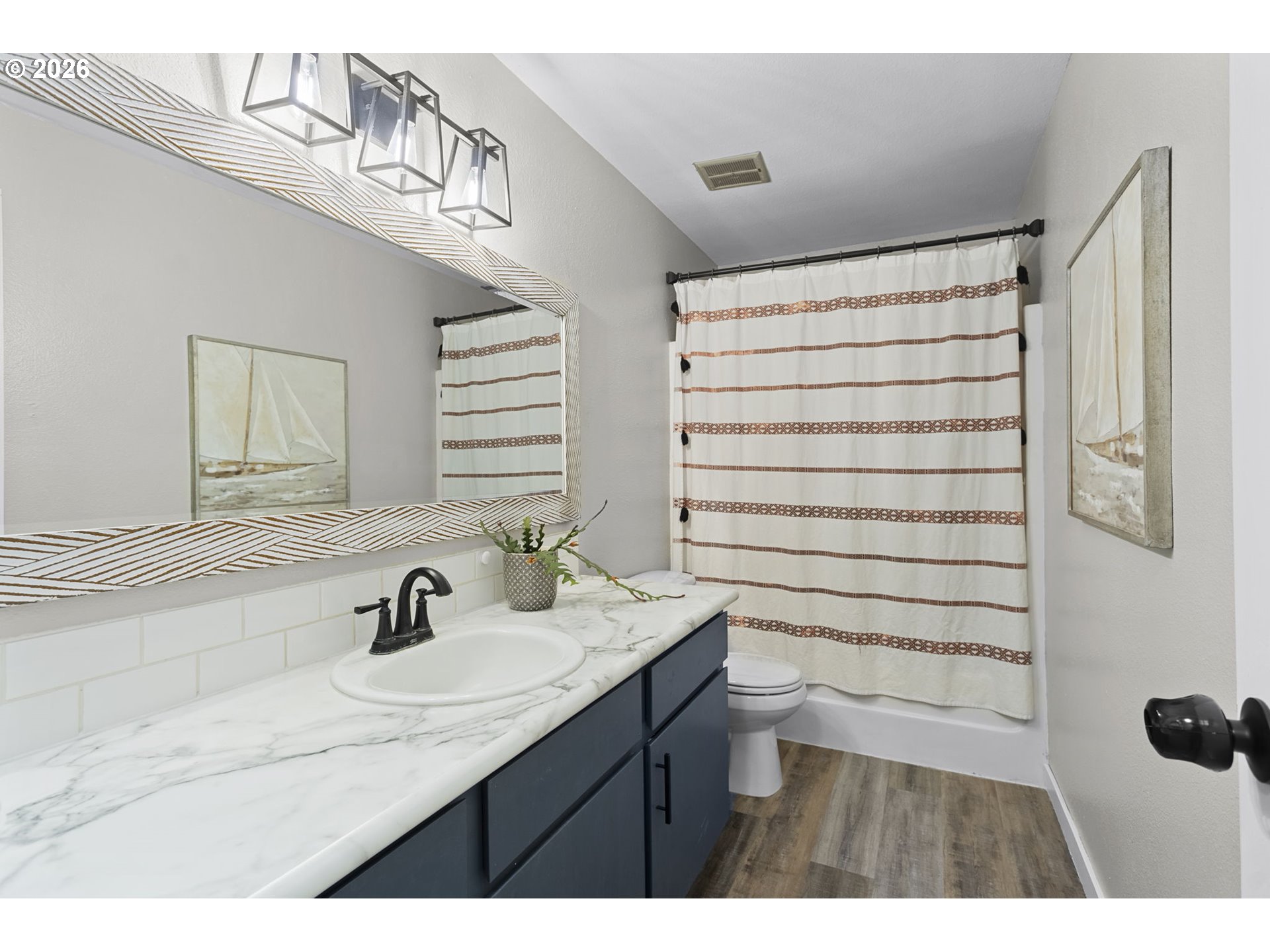7 Olive Court Longview, WA 98632 - Photo 20 of 35 a bathroom with a sink a toilet and shower