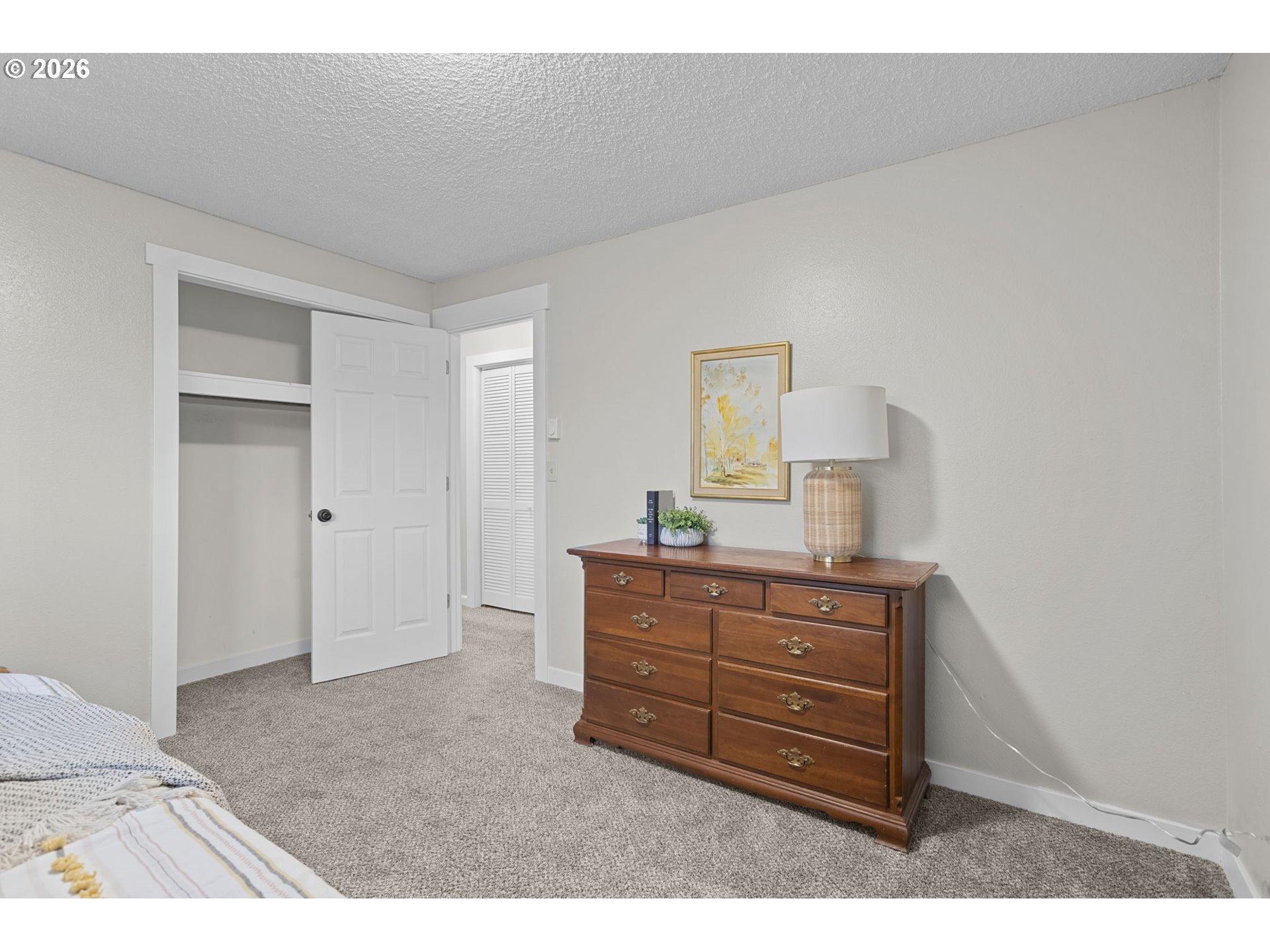 7 Olive Court Longview, WA 98632 - Photo 22 of 35 a room with a dresser and a mirror