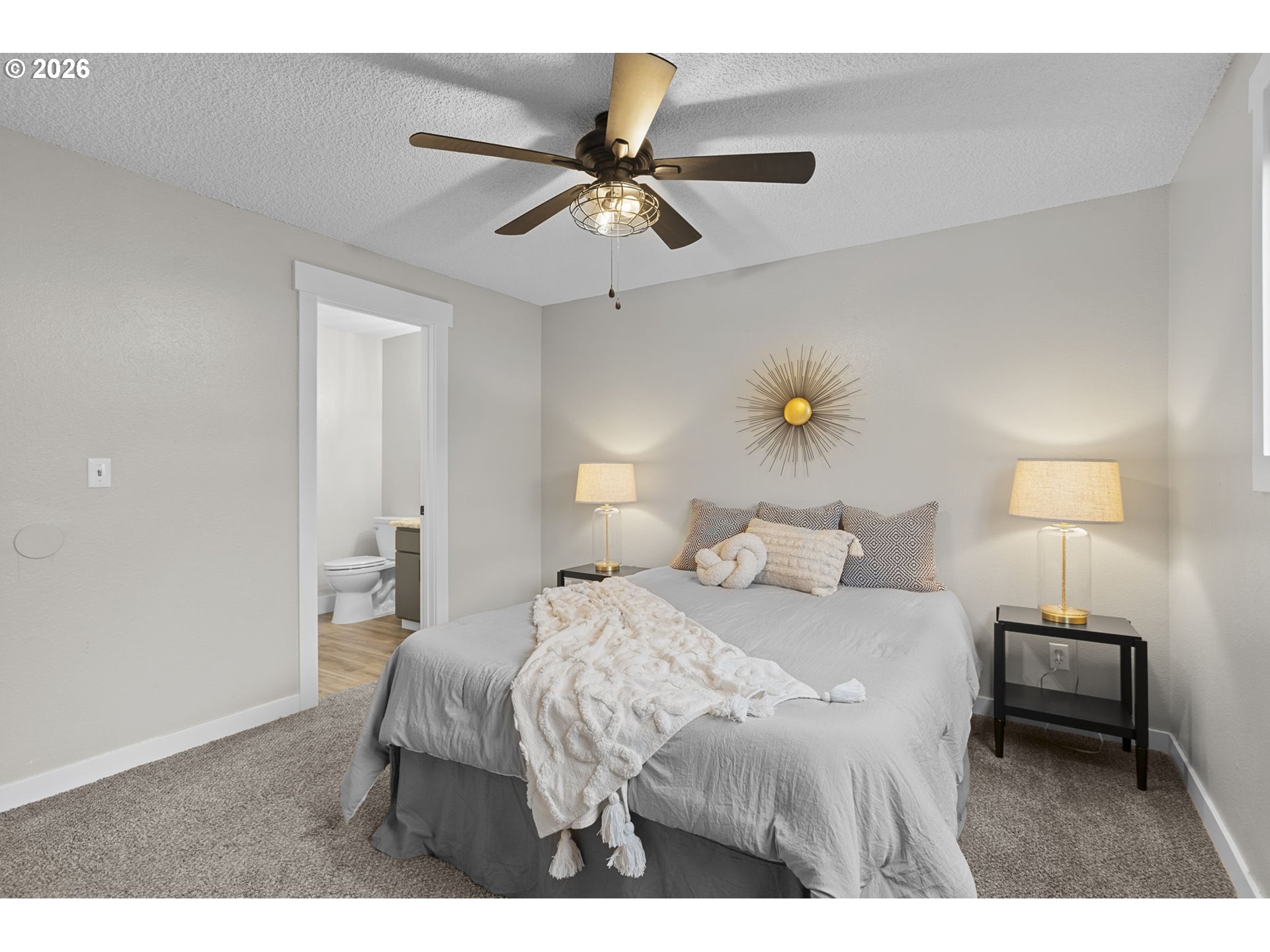 7 Olive Court Longview, WA 98632 - Photo 24 of 35 a bedroom with a bed and a table
