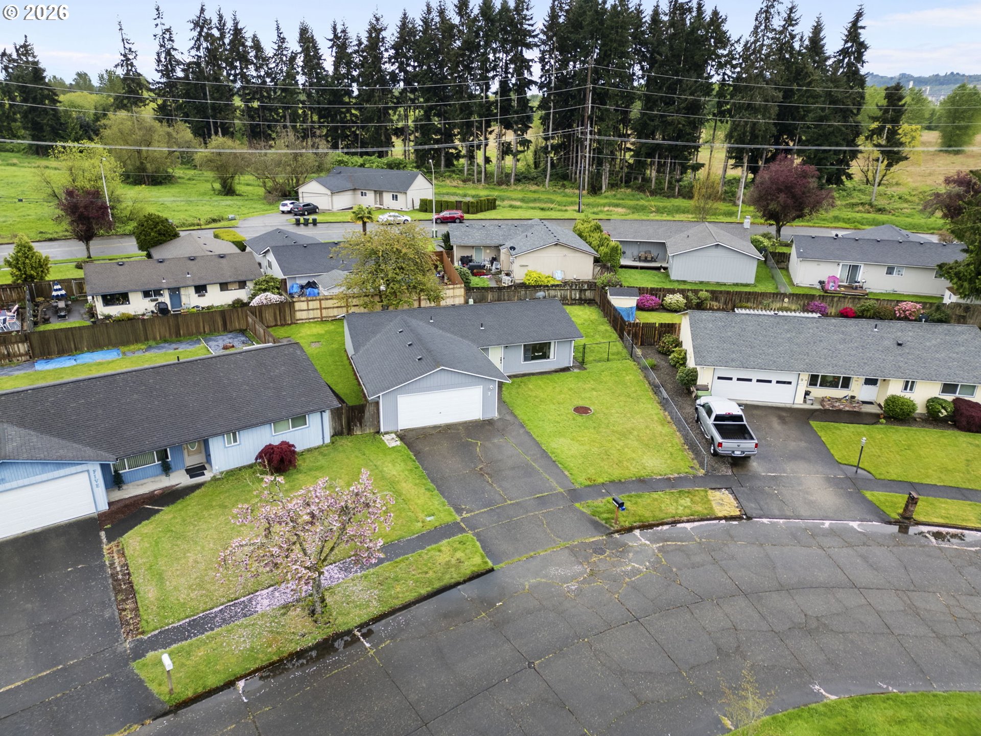 7 Olive Court Longview, WA 98632 - Photo 32 of 35 an aerial view of a house with a garden and lake view