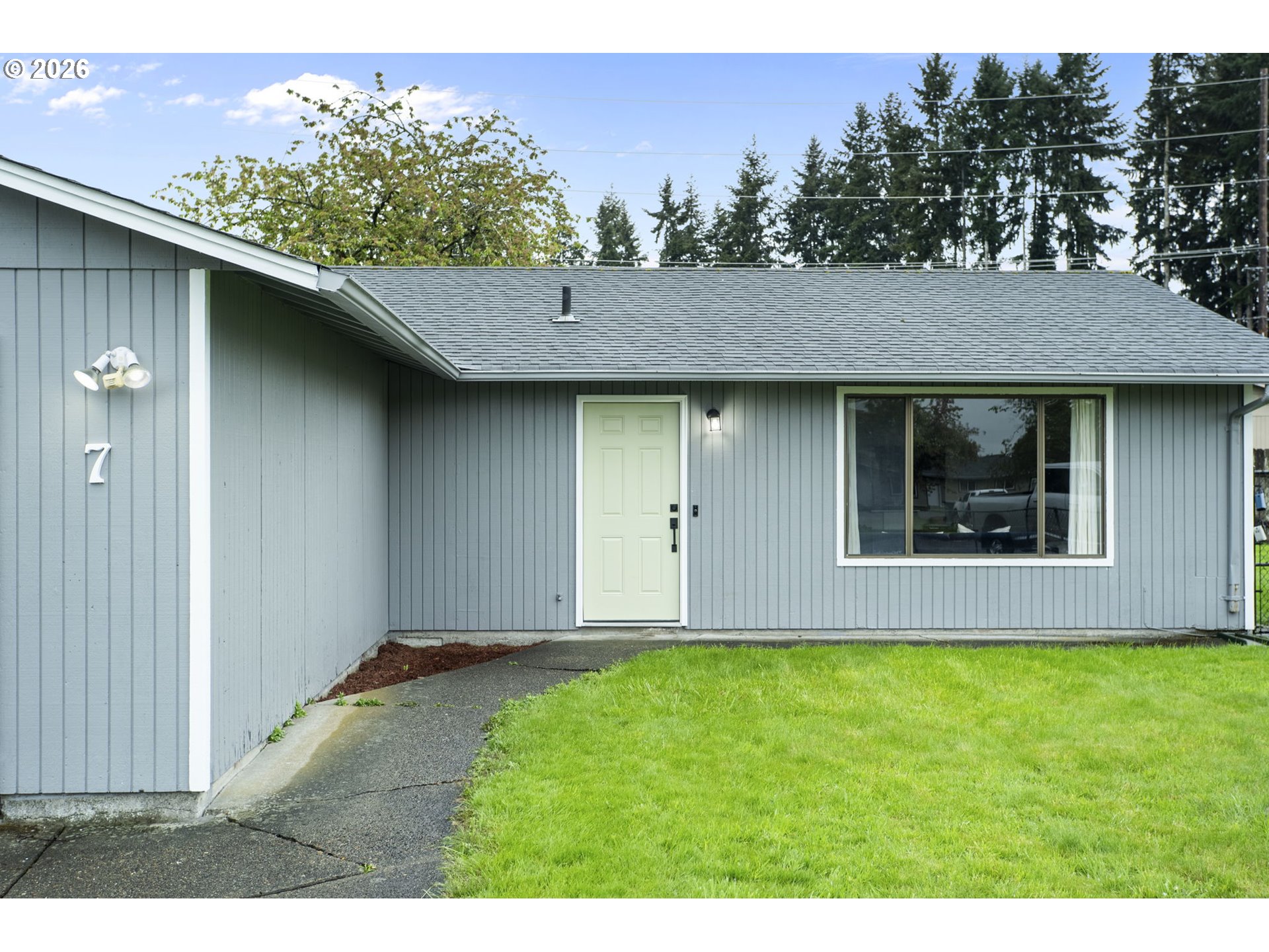 7 Olive Court Longview, WA 98632 - Photo 6 of 35 a house with trees in the background