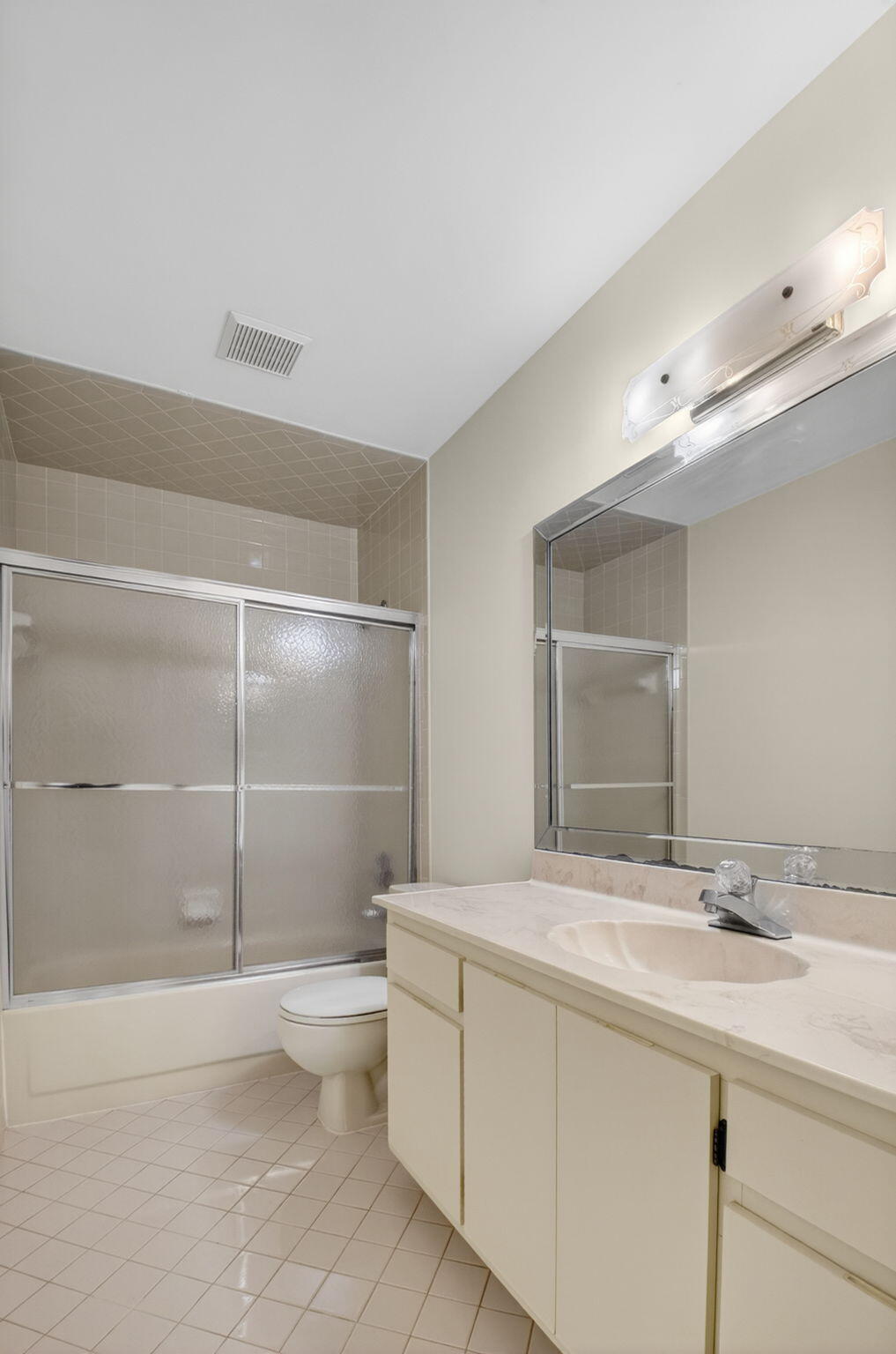 6321 Lasalle Road Delray Beach, FL 33484 - Photo 13 of 38 a bathroom with a sink toilet and shower