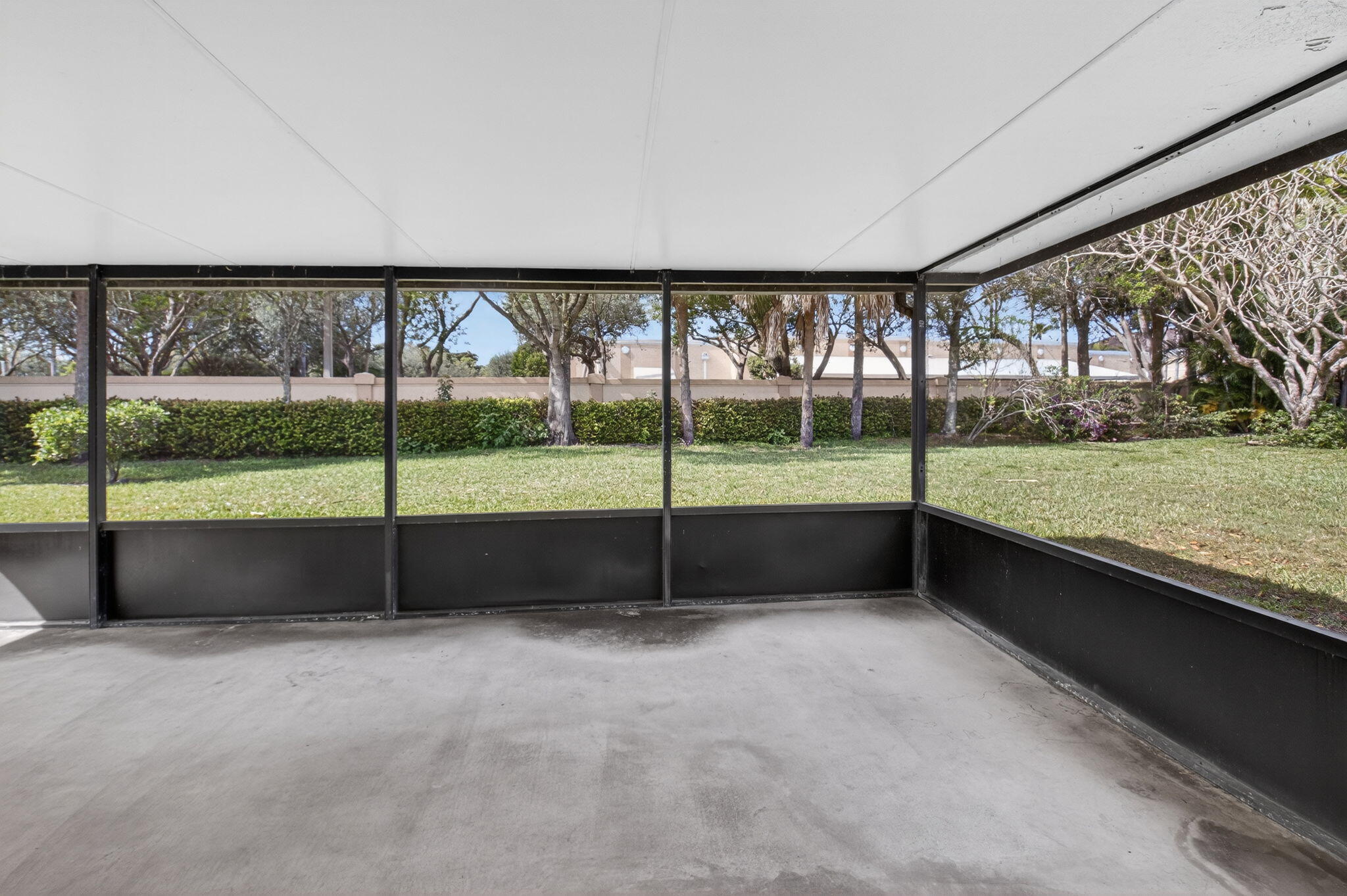 6321 Lasalle Road Delray Beach, FL 33484 - Photo 17 of 38 a view of an empty room with a balcony