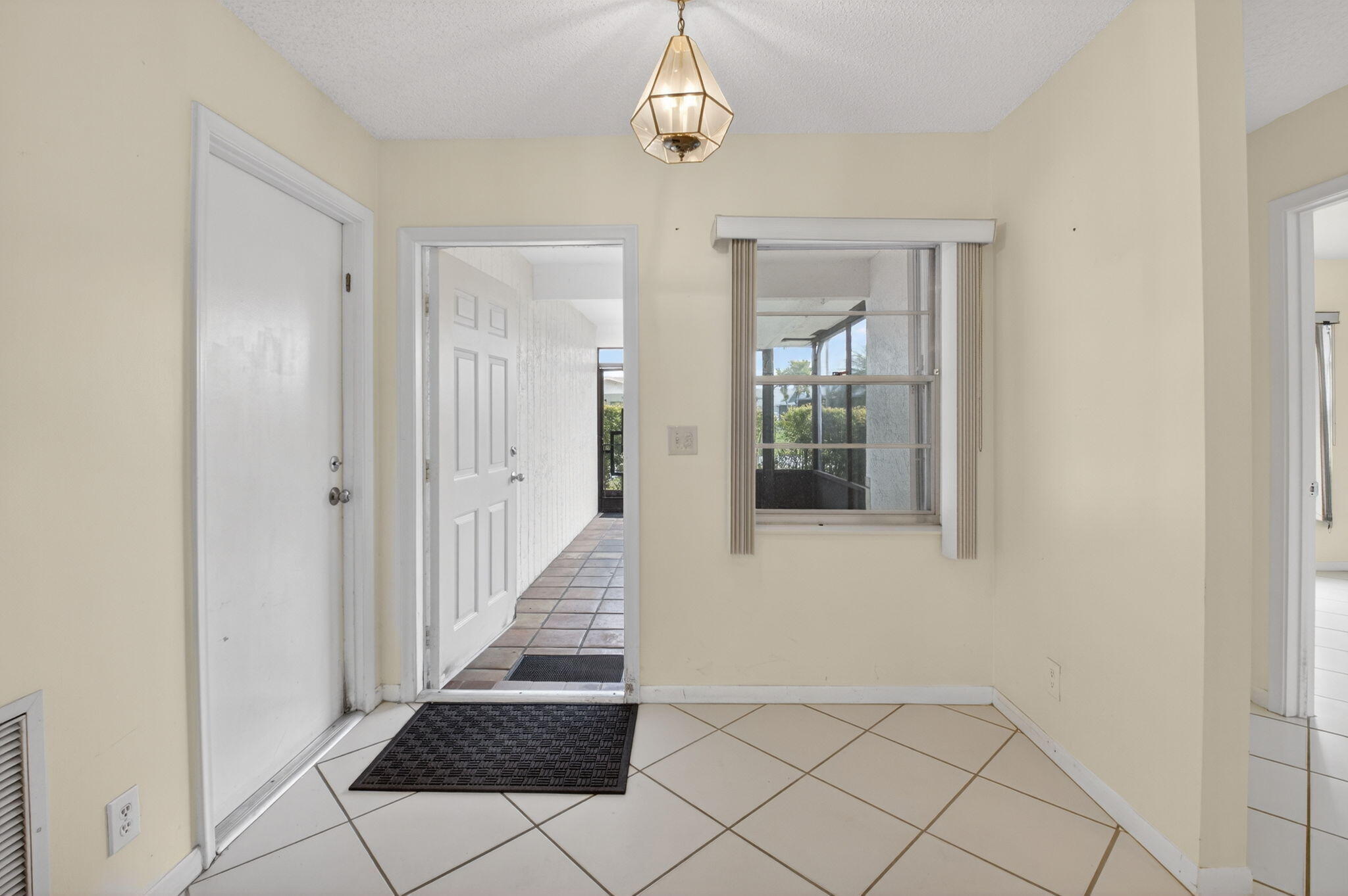 6321 Lasalle Road Delray Beach, FL 33484 - Photo 19 of 38 a view of a hallway with wooden floor and staircase