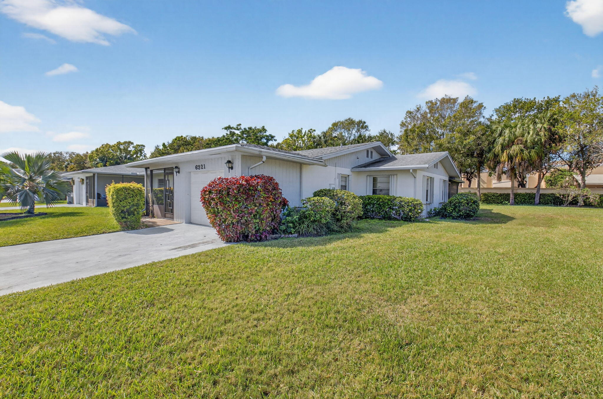 6321 Lasalle Road Delray Beach, FL 33484 - Photo 2 of 38 a view of a house with backyard and garden