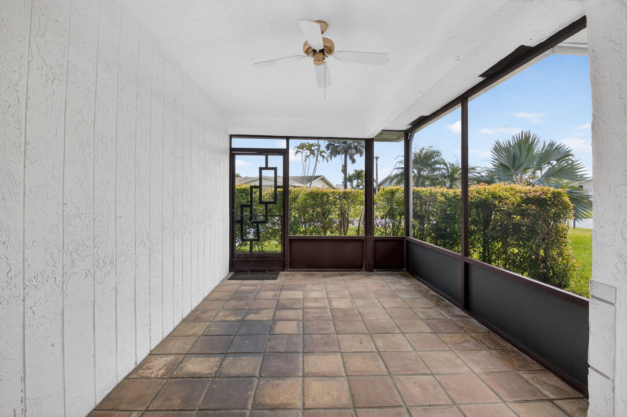 6321 Lasalle Road Delray Beach, FL 33484 - Photo 21 of 38 wooden floor in an empty room with a window