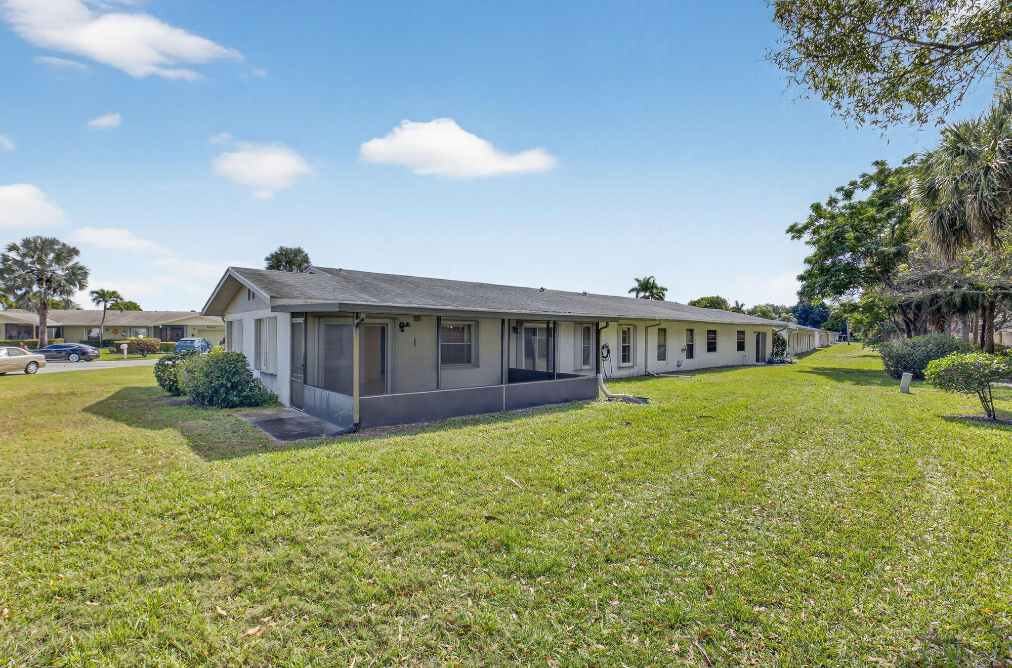 6321 Lasalle Road Delray Beach, FL 33484 - Photo 23 of 38 a view of an house with backyard and sitting area