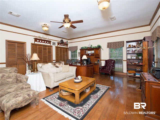 640 Spanish Main Spanish Fort, AL 36527 - Photo 8 of 33 In addition to the large living area, you also have a large 24x24 den/office or do what you wish with this great space.