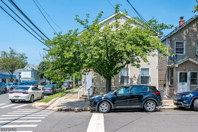 a car parked in front of a house