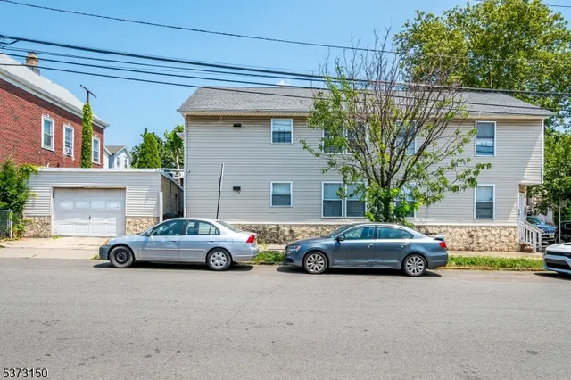 a car parked in front of a house