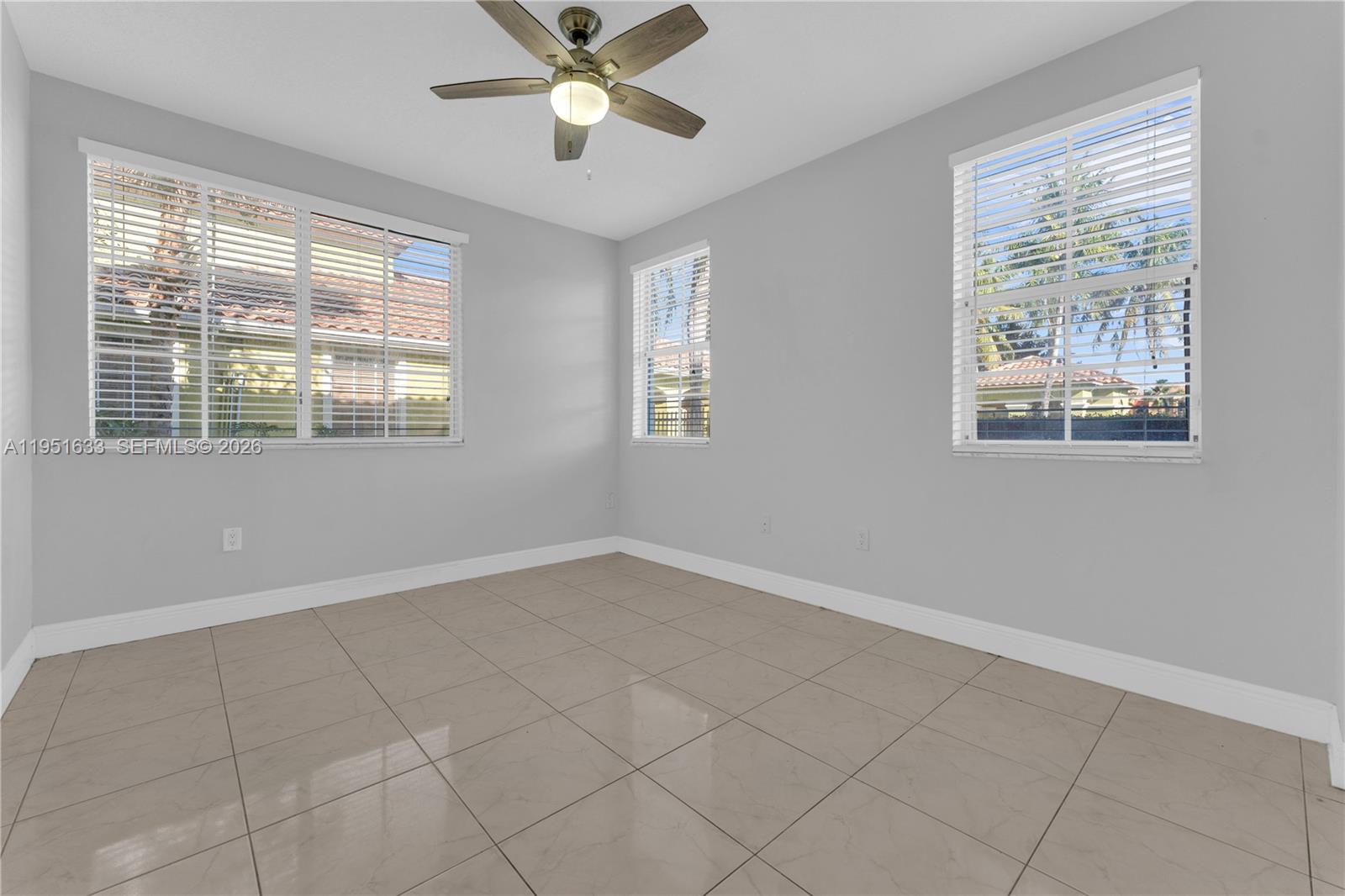 2400 East Preserve Way, Unit 101 Miramar, FL 33025 - Photo 19 of 41 a view of an empty room with a window