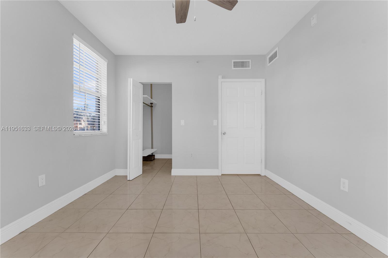2400 East Preserve Way, Unit 101 Miramar, FL 33025 - Photo 21 of 41 an empty room with windows