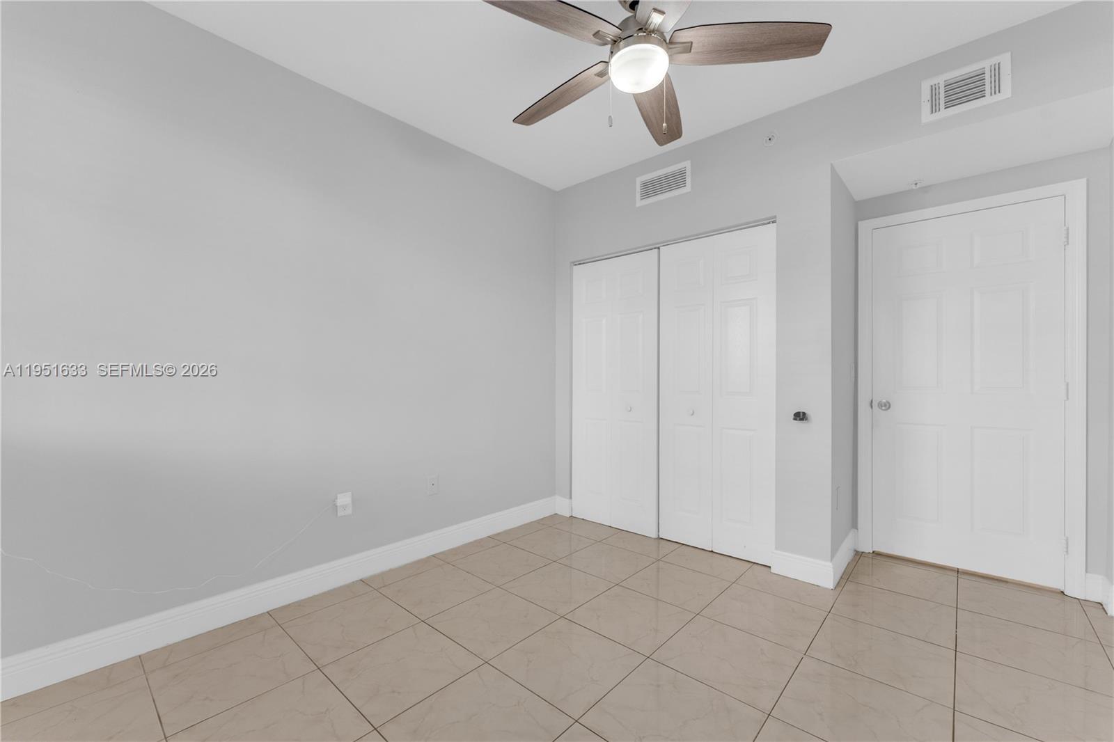 2400 East Preserve Way, Unit 101 Miramar, FL 33025 - Photo 25 of 41 wooden floor in an empty room