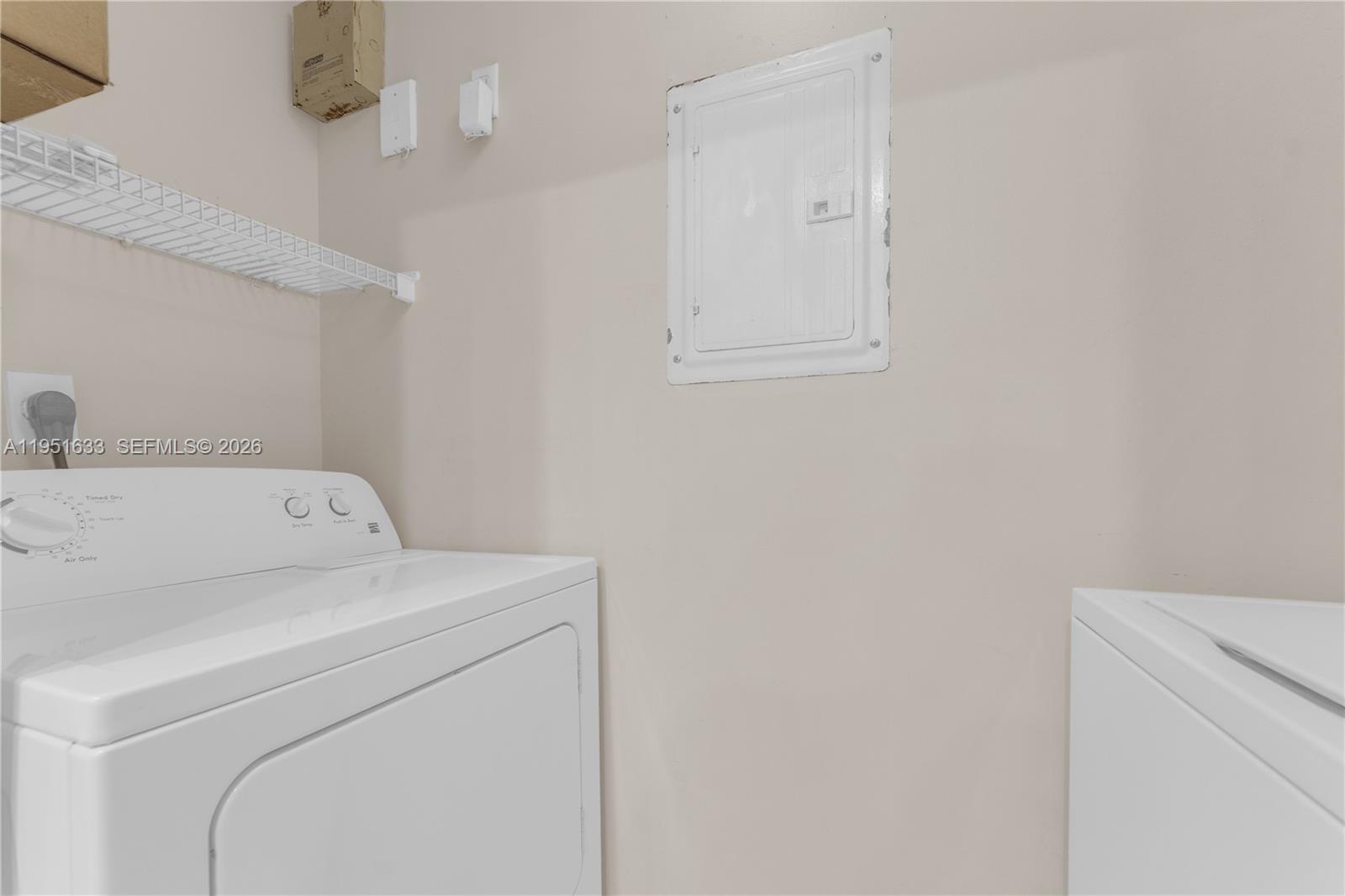 2400 East Preserve Way, Unit 101 Miramar, FL 33025 - Photo 26 of 41 a utility room with dryer and washer