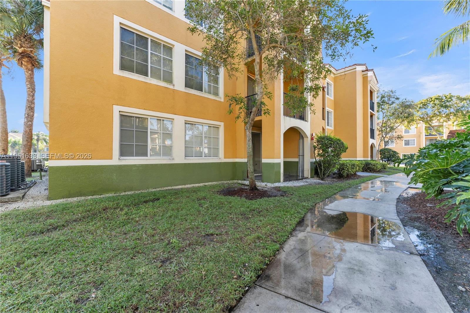 2400 East Preserve Way, Unit 101 Miramar, FL 33025 - Photo 32 of 41 a front view of a house with a yard