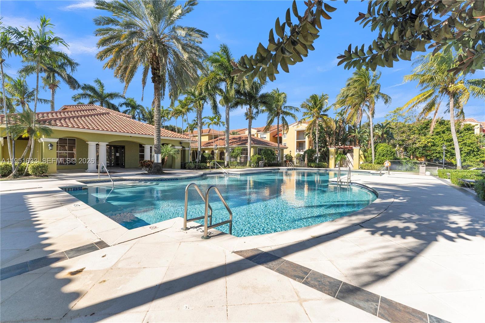 2400 East Preserve Way, Unit 101 Miramar, FL 33025 - Photo 34 of 41 a view of a water fountain and palm trees