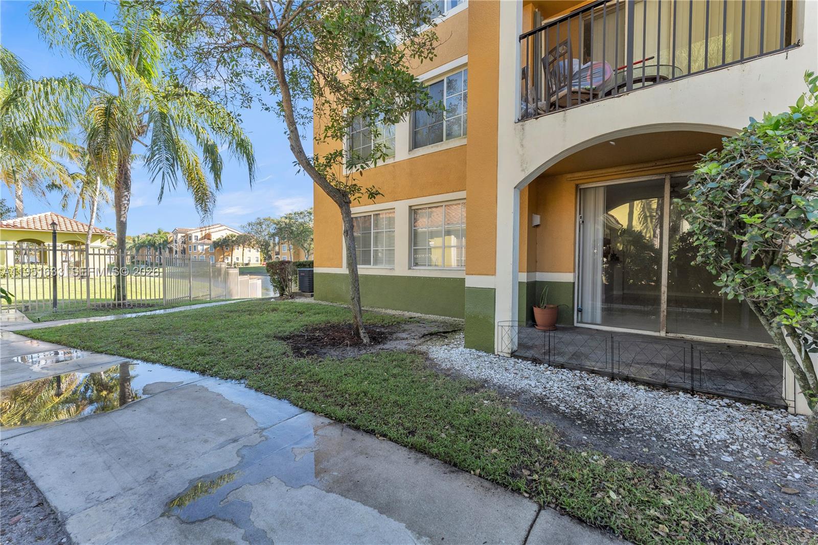 2400 East Preserve Way, Unit 101 Miramar, FL 33025 - Photo 40 of 41 a view of a house with a yard