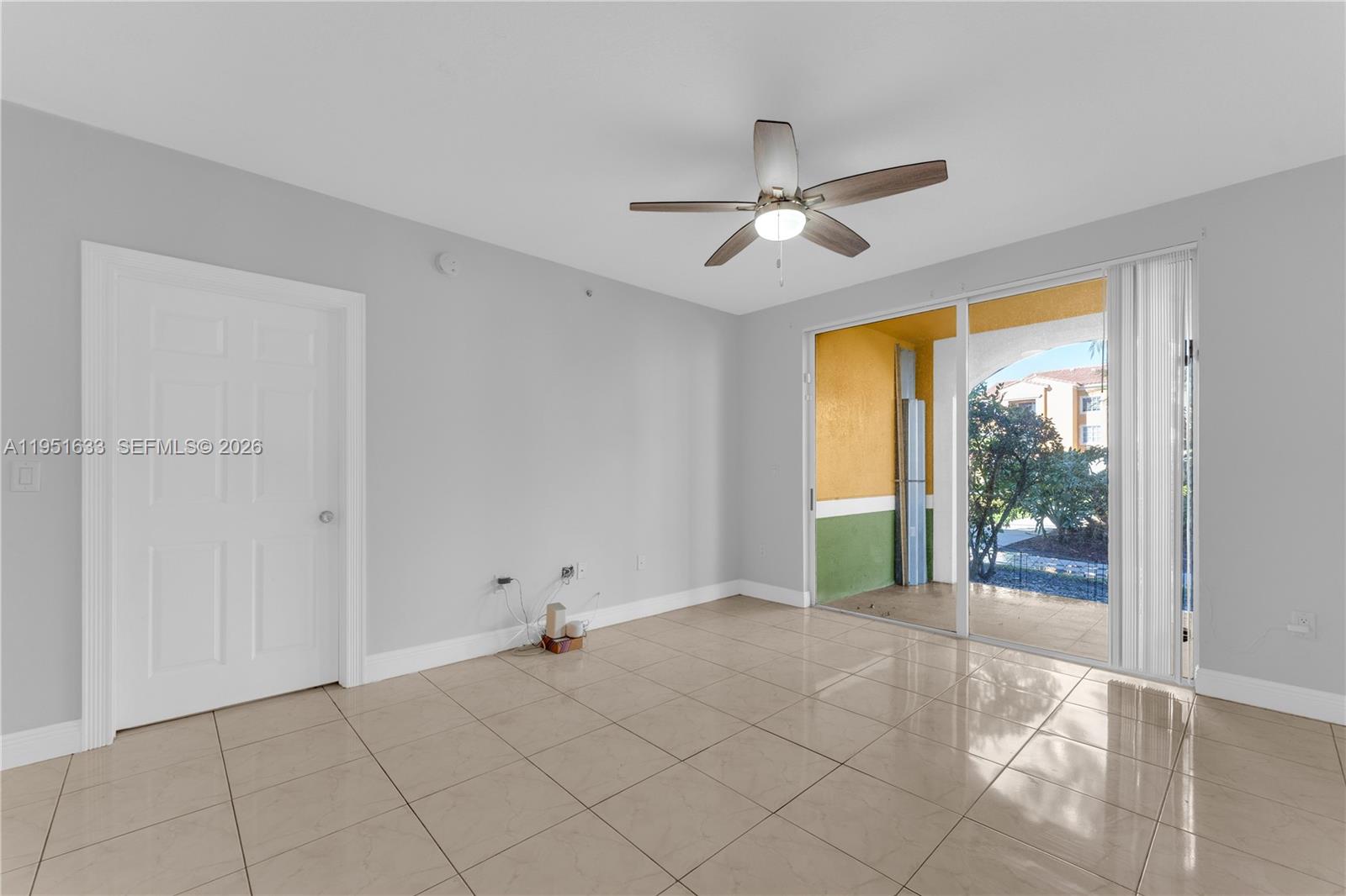 2400 East Preserve Way, Unit 101 Miramar, FL 33025 - Photo 5 of 41 a view of an empty room with a window