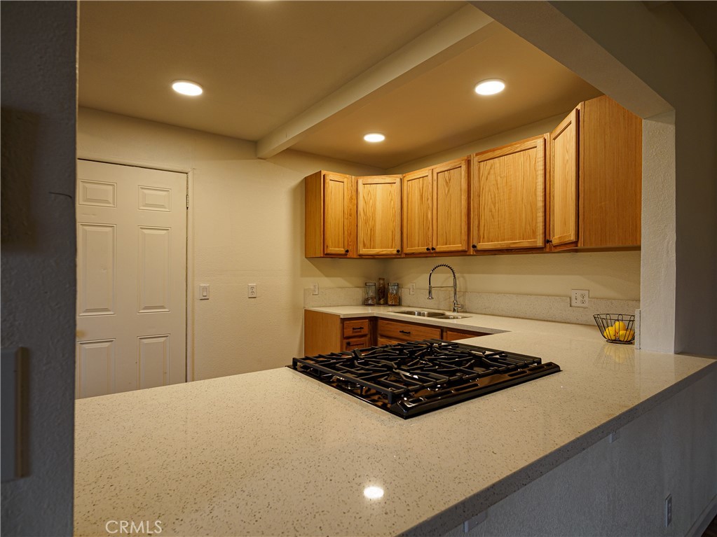 1745 Dale Avenue Merced, CA 95340 - Photo 6 of 18 a kitchen with a stove a sink and cabinets
