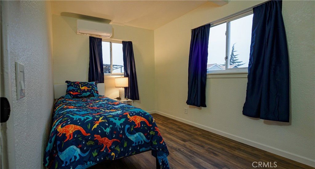 1745 Dale Avenue Merced, CA 95340 - Photo 10 of 18 a bedroom with a bed and a window