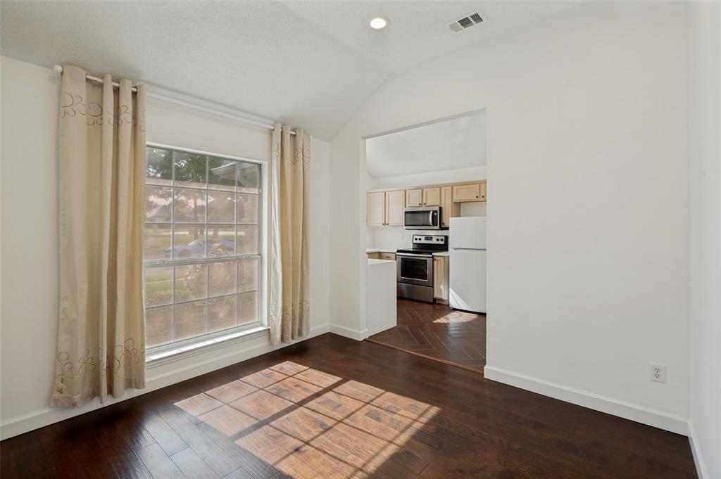 8160 Tower Road Frisco, TX 75035 - Photo 4 of 25 a view of kitchen with furniture and wooden floor